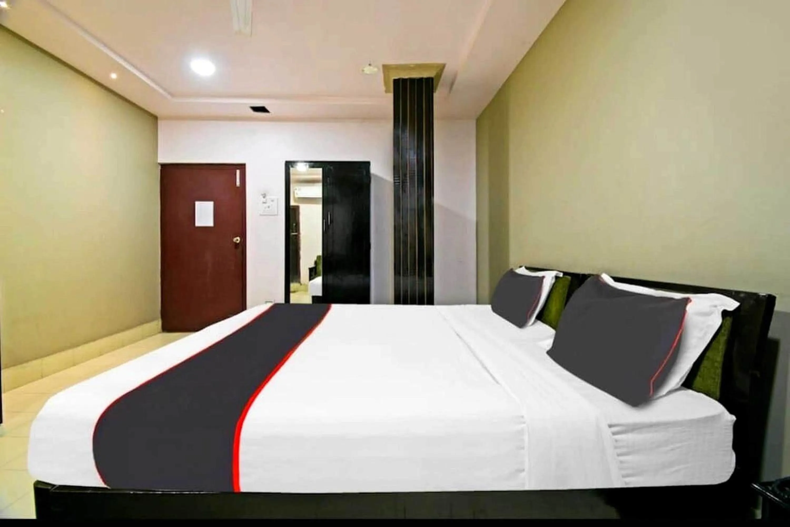 Bedroom in Collection O Megha Resort