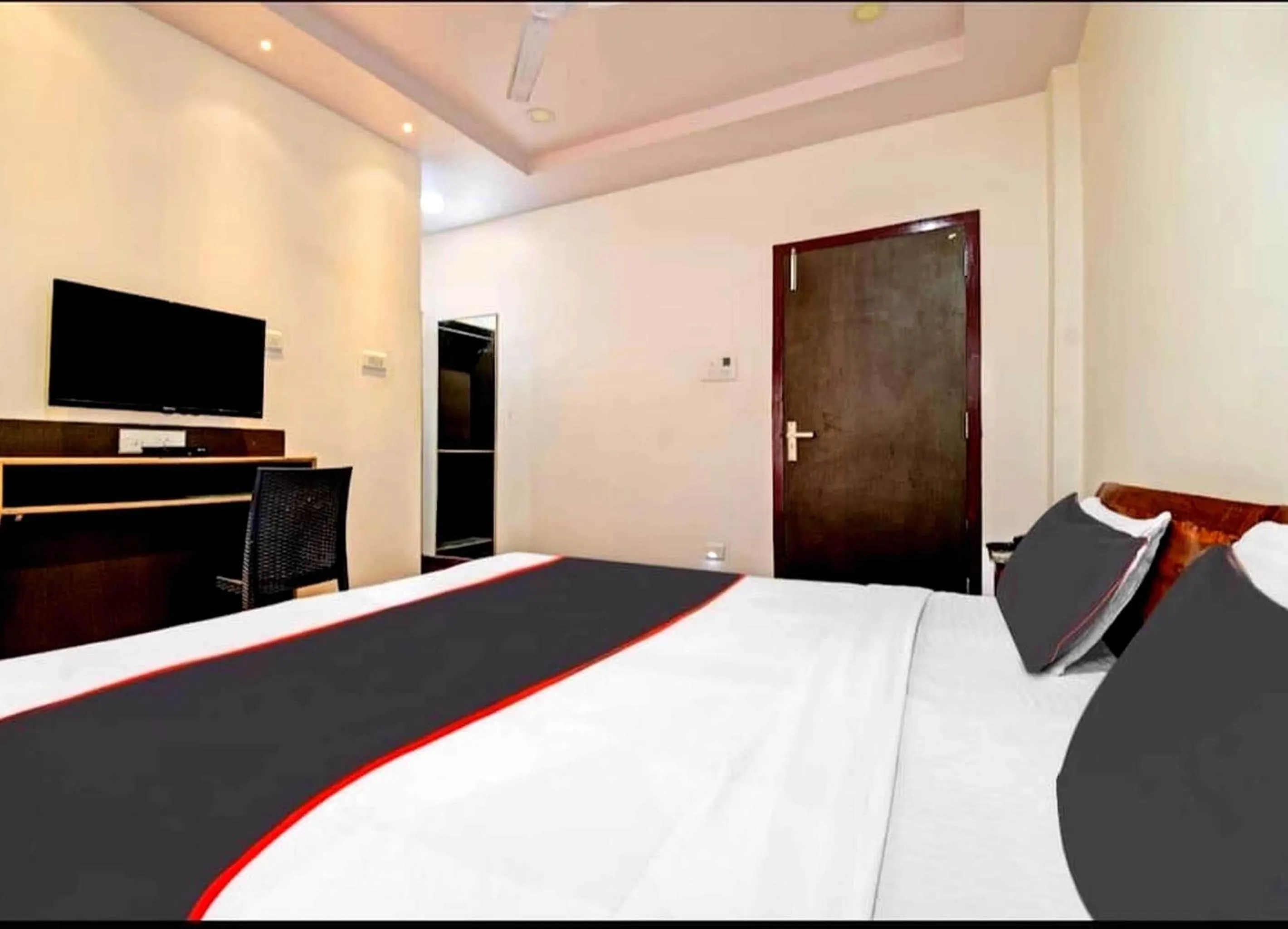 Bedroom in Collection O Megha Resort