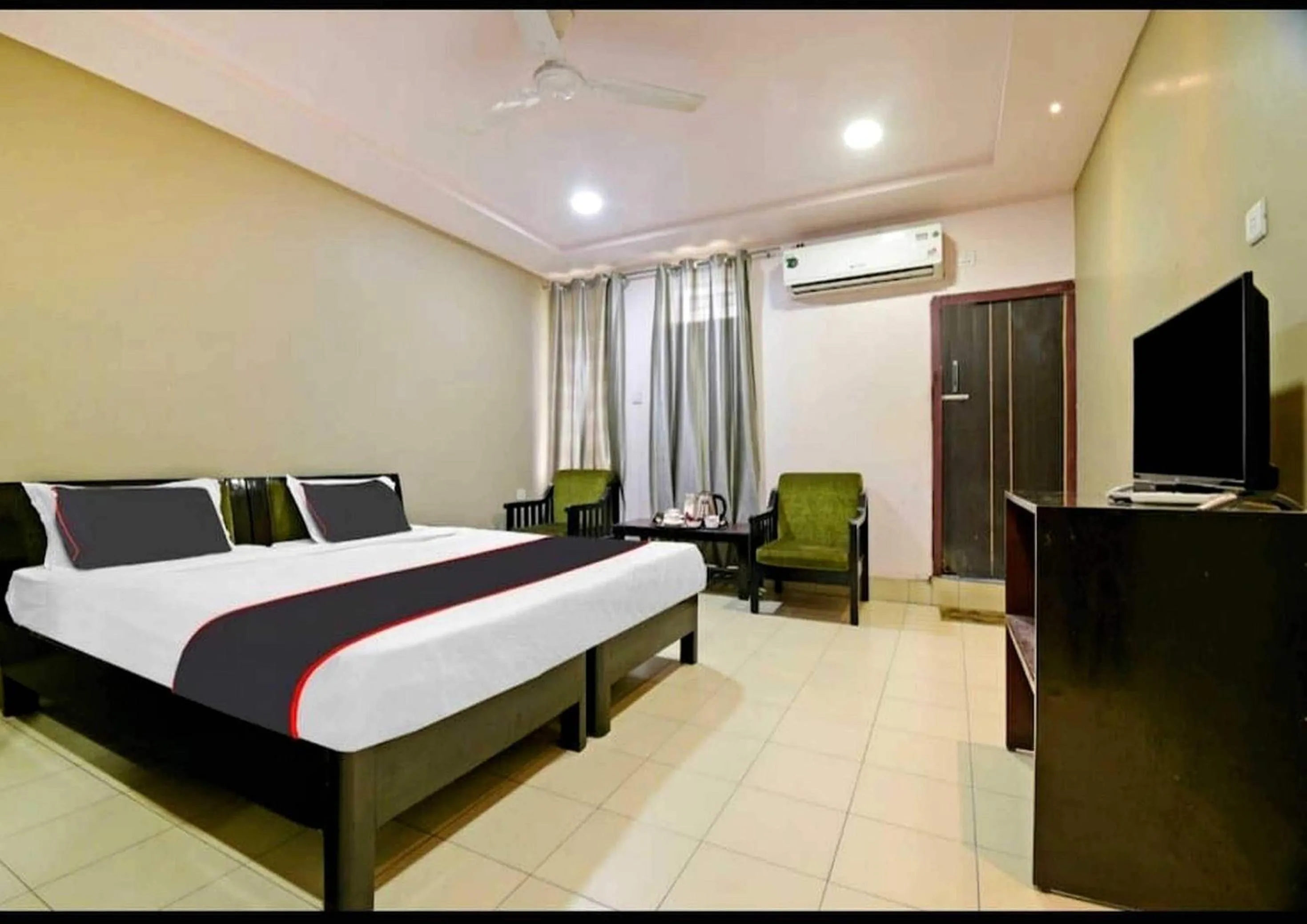 Bedroom in Collection O Megha Resort