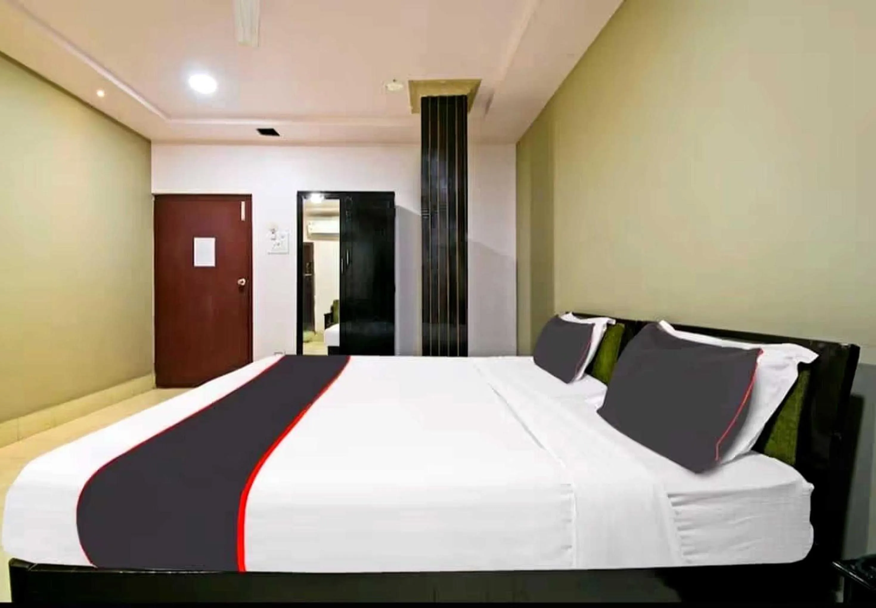 Bedroom in Collection O Megha Resort