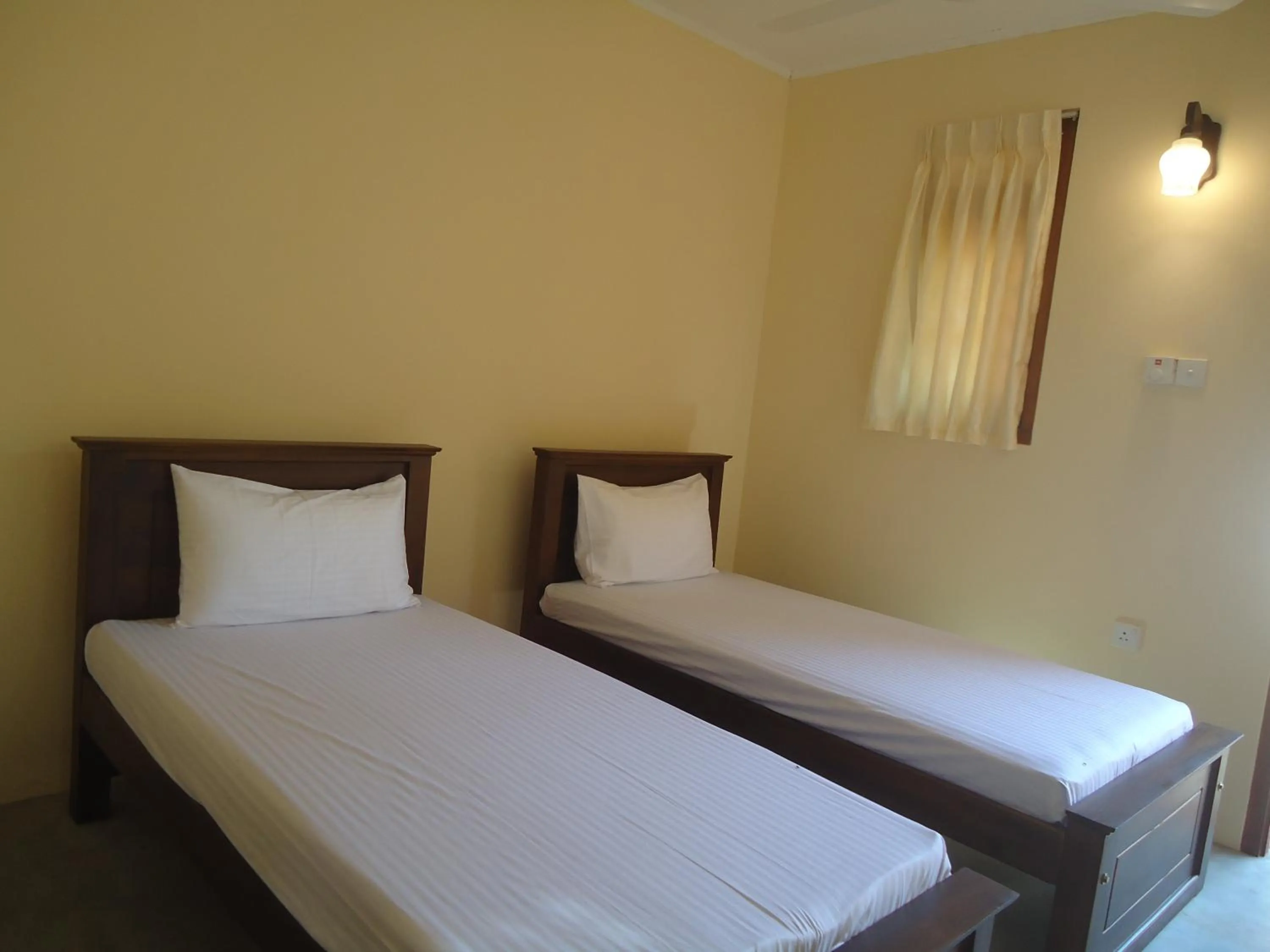 Photo of the whole room, Bed in New Sanmi Resort