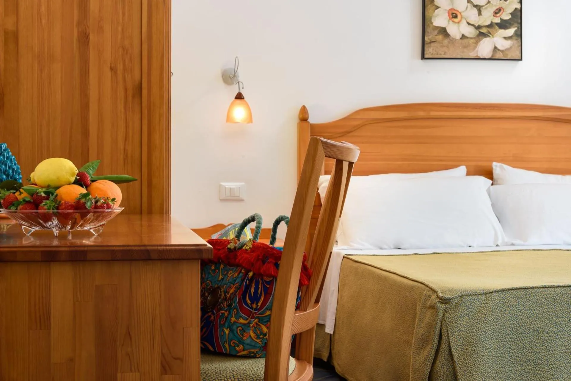 Bed in La Meridiana Hotel