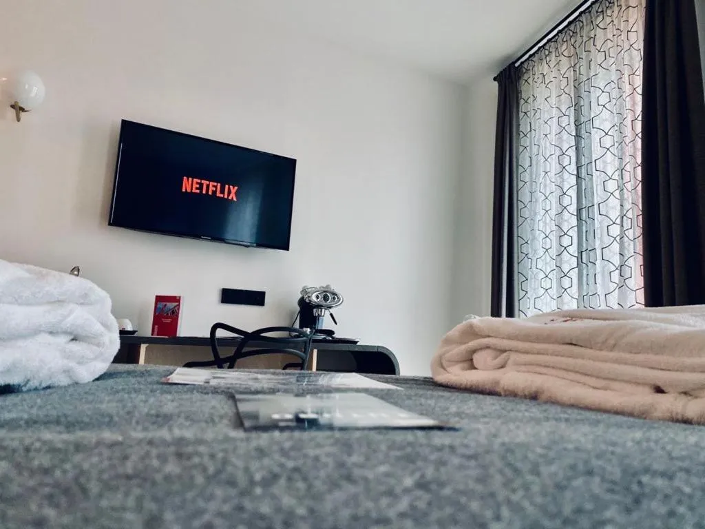 TV and multimedia, Bed in Antica Pusterla Relais de Charme