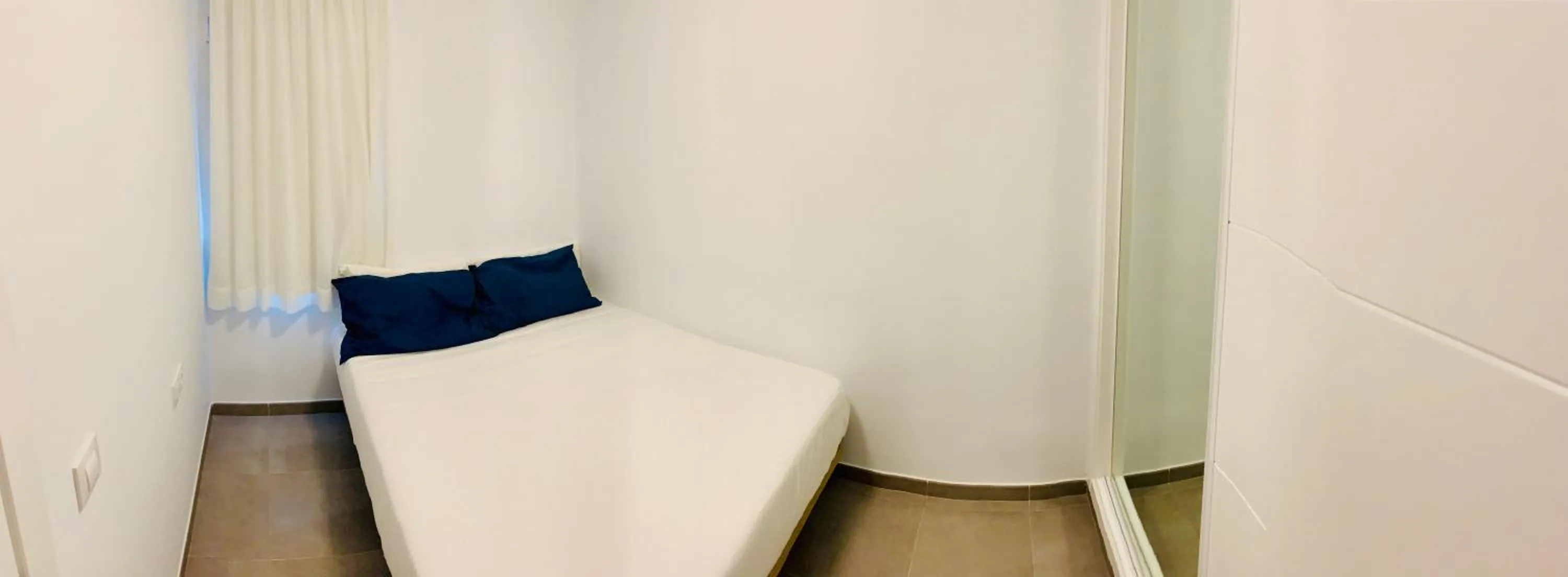 Bed in Apartamentos Zalabar