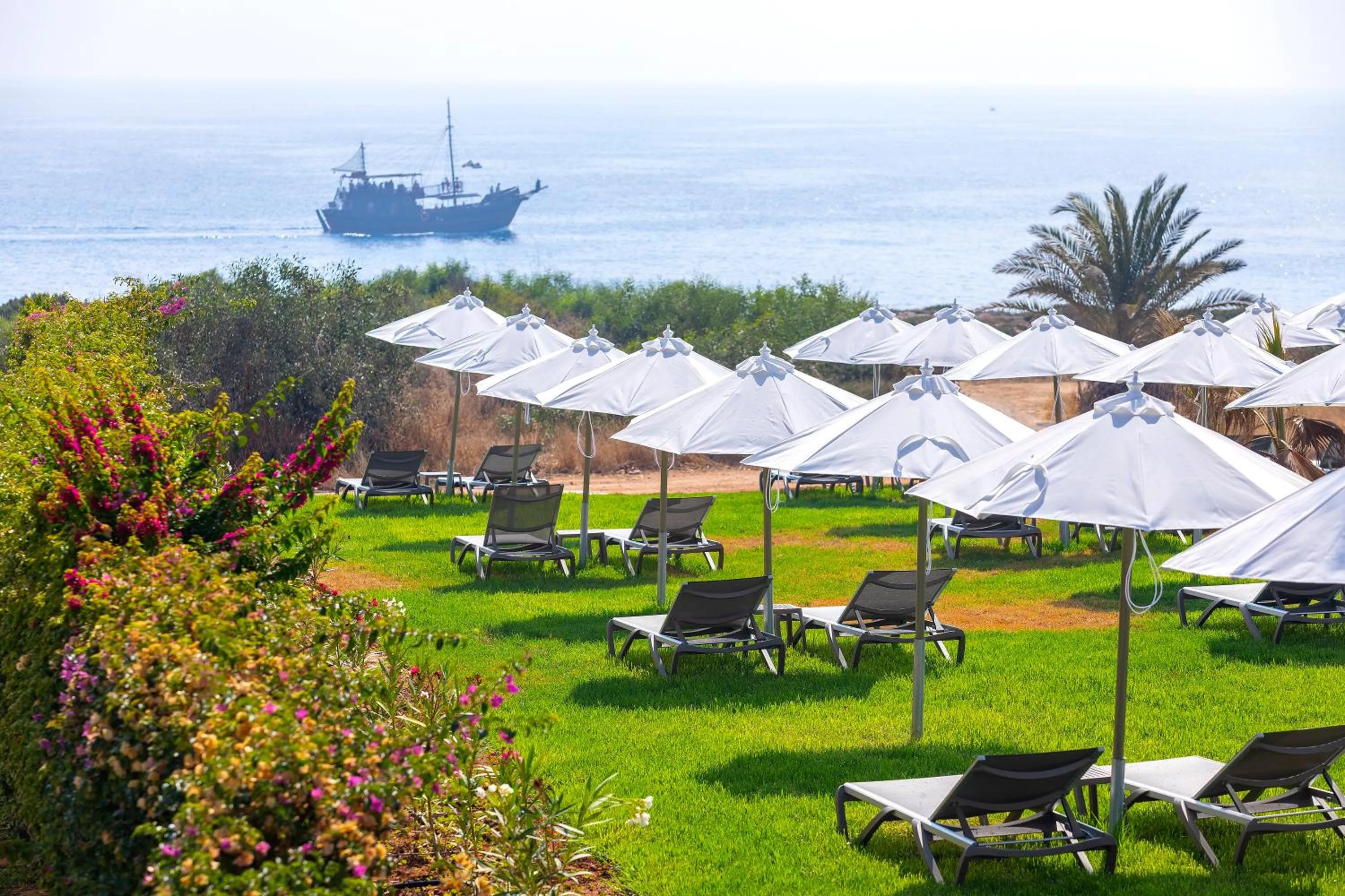 Garden view in Leonardo Crystal Cove Hotel & Spa – Adults only