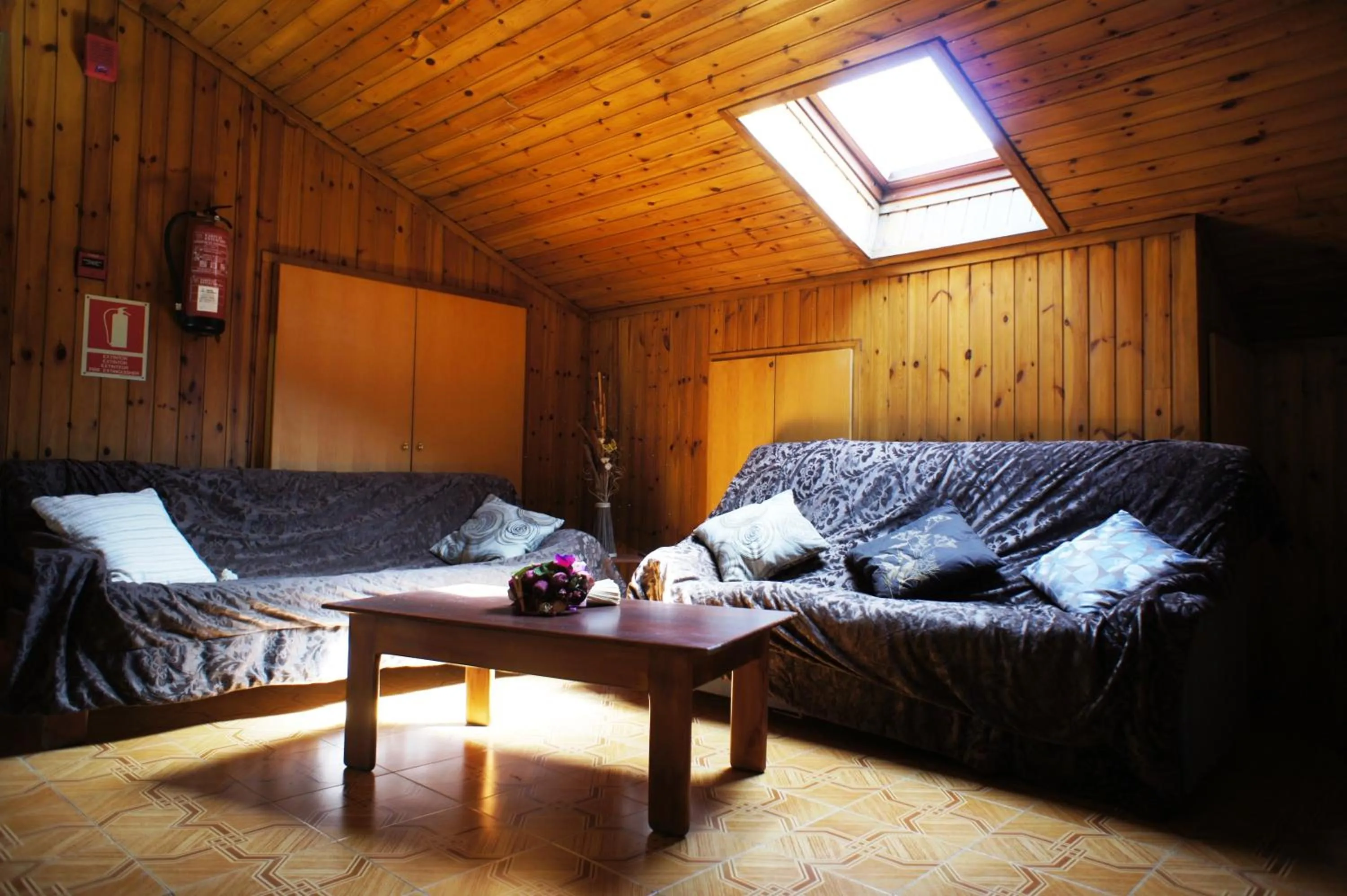 Communal lounge/ TV room in Hotel La Planada