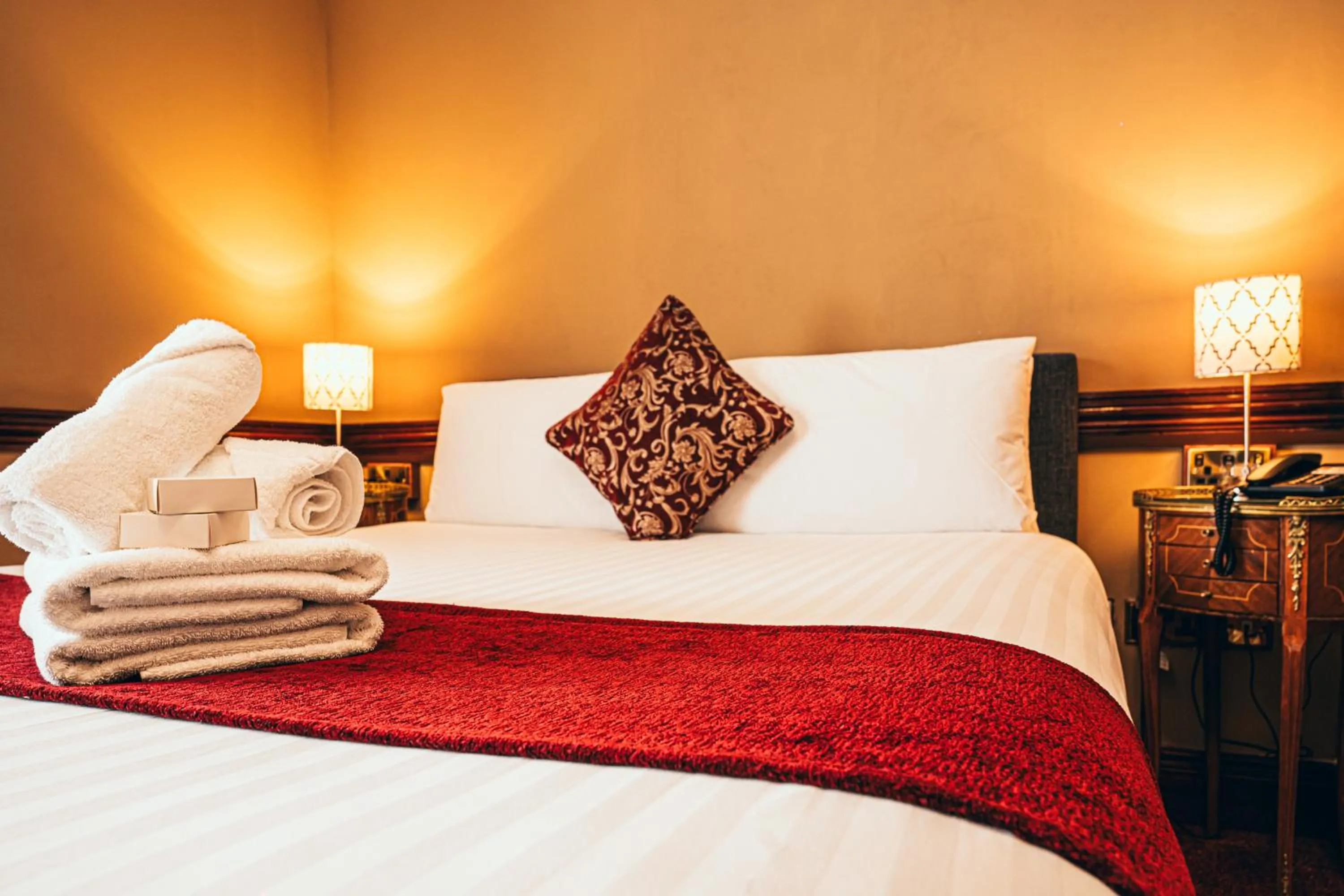 Bed in Russell Court Hotel