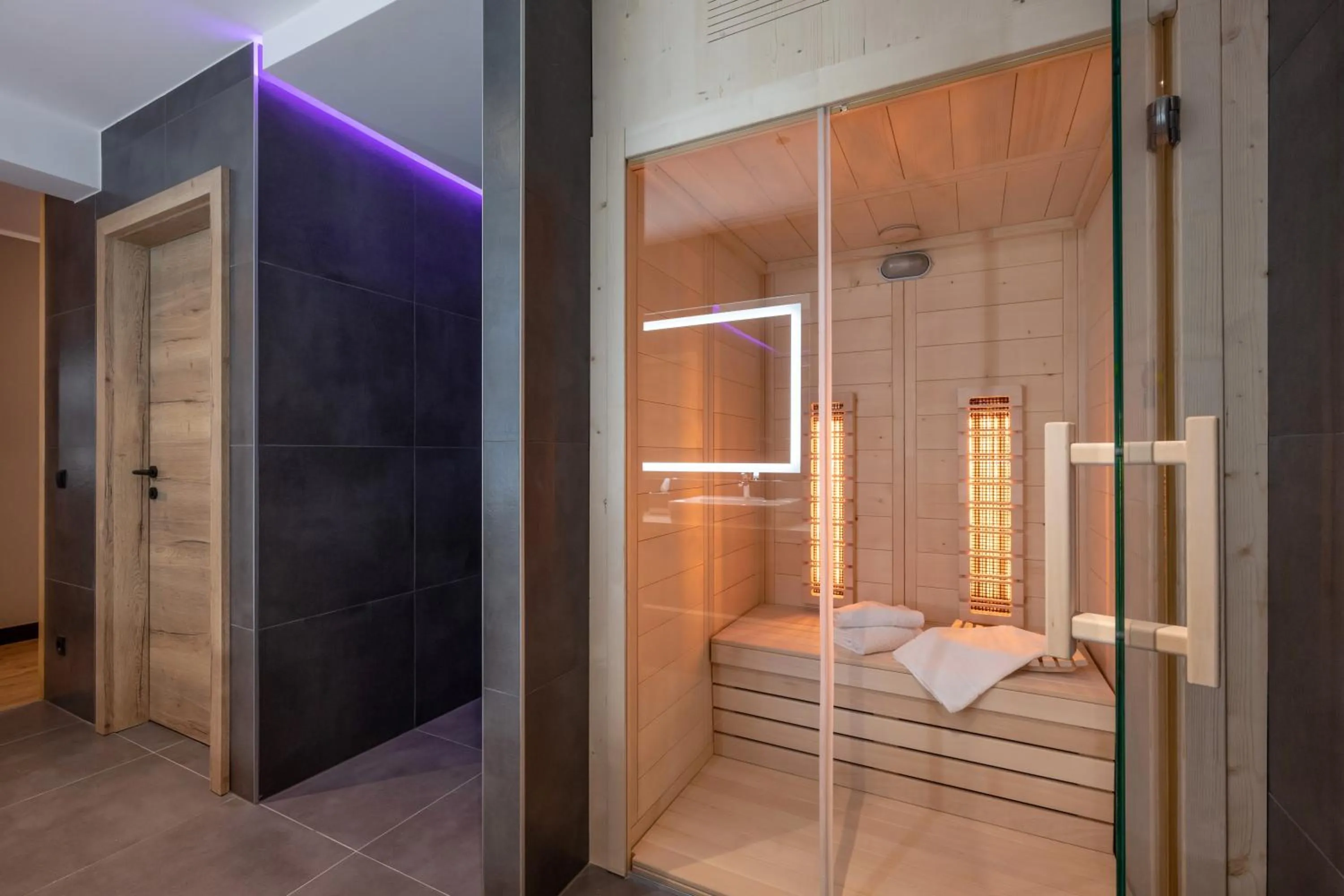 Bathroom, Bed in Hotel Adapura Wagrain