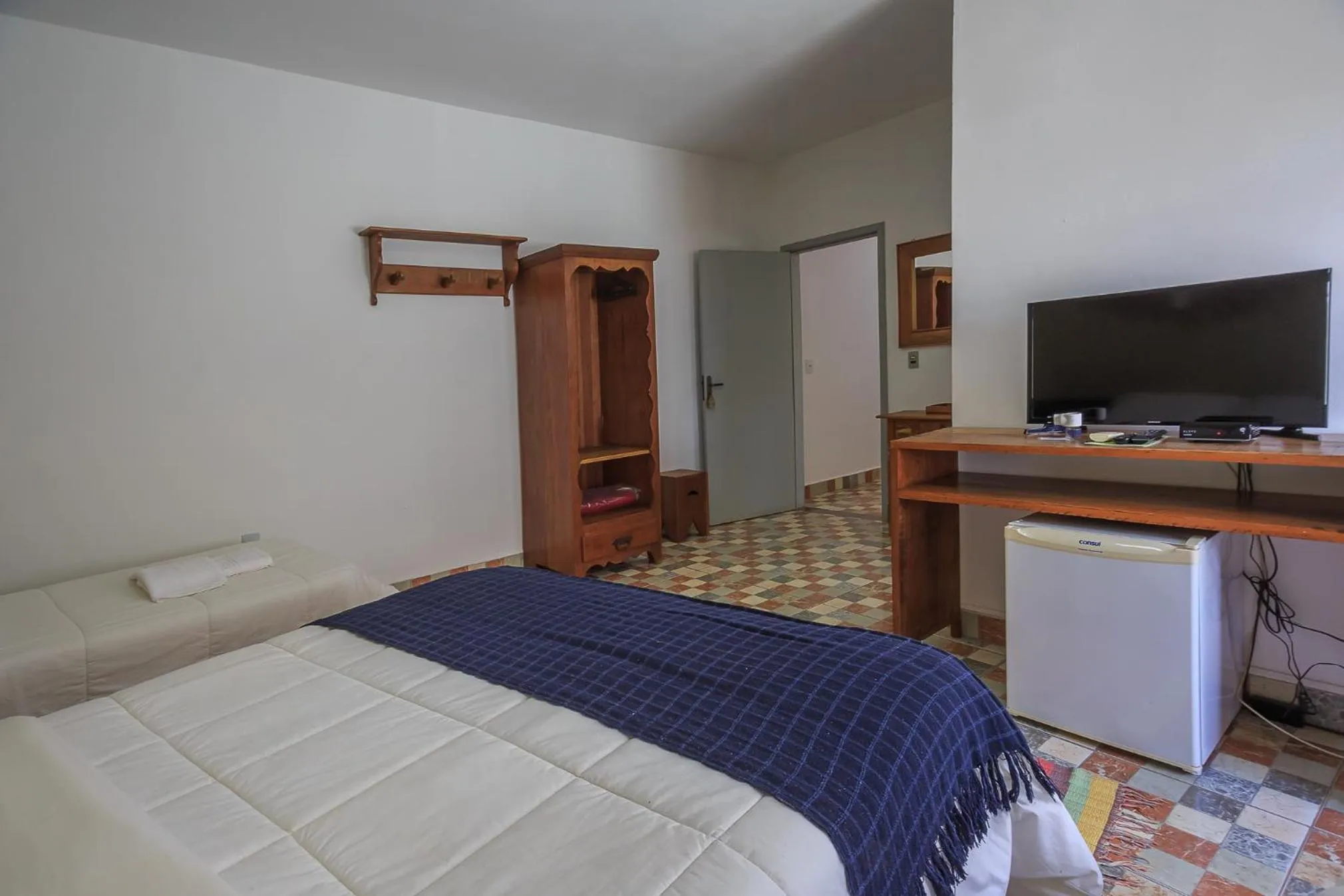 Bed in Pousada Neuza Barbosa