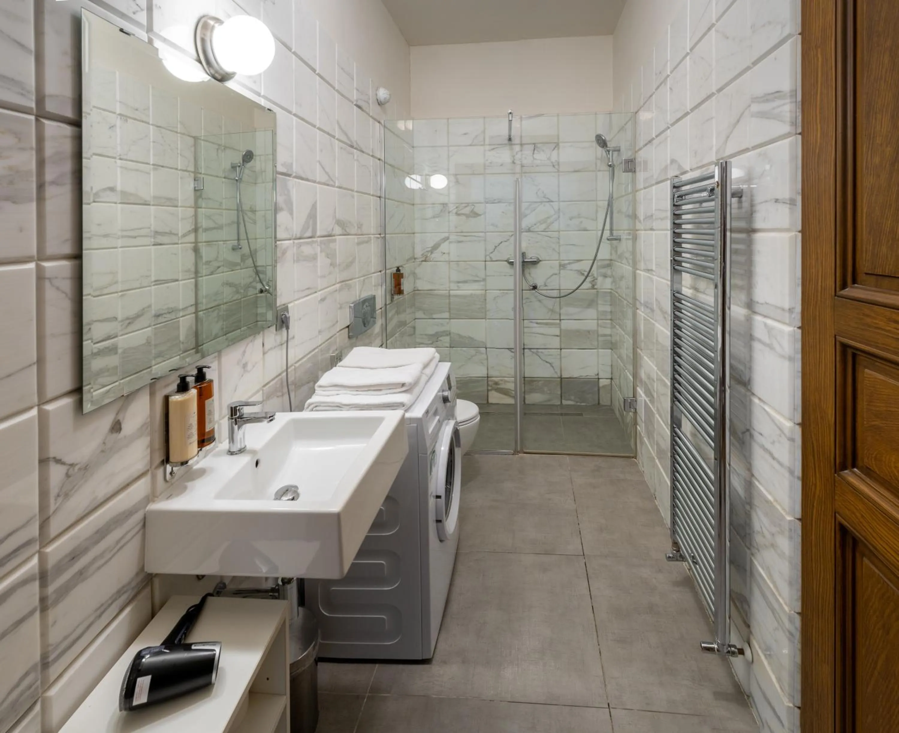 Bathroom in Art House Apartments by Adrez