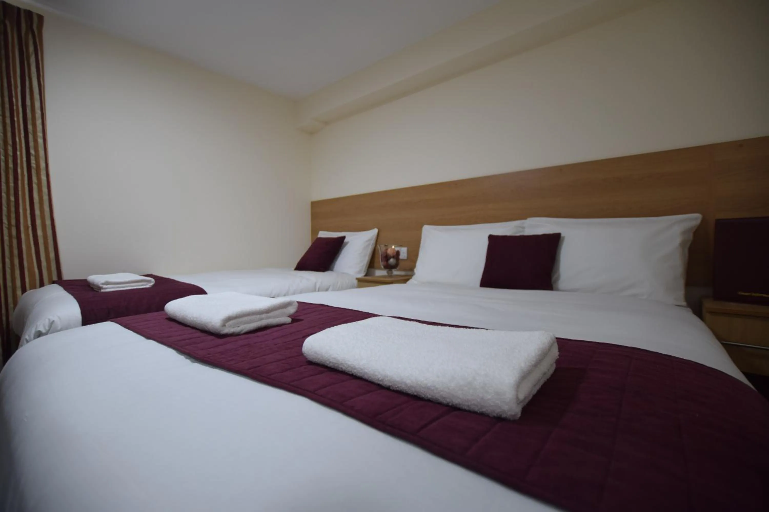Bedroom, Bed in PremierLux Serviced Apartments