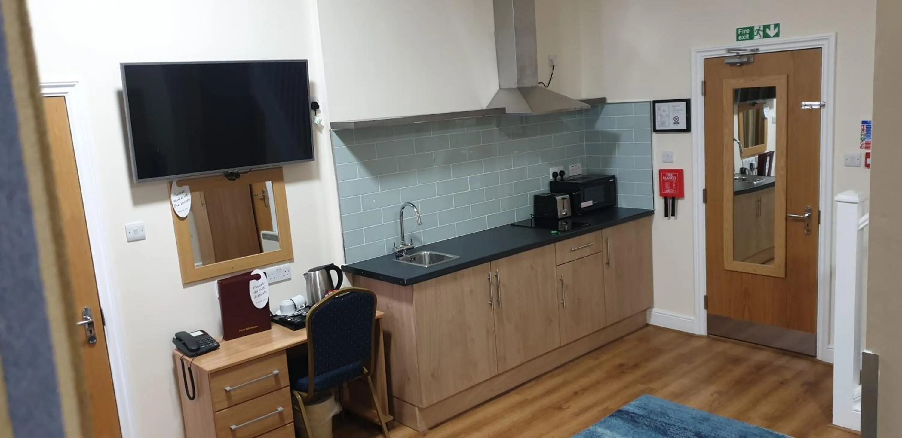Kitchen or kitchenette in PremierLux Serviced Apartments