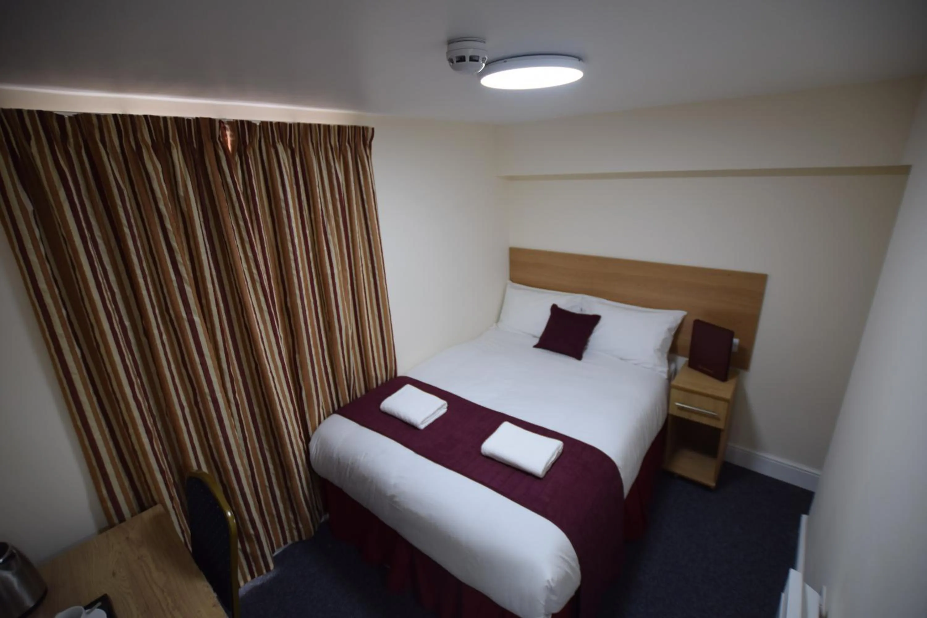 Bedroom, Bed in PremierLux Serviced Apartments