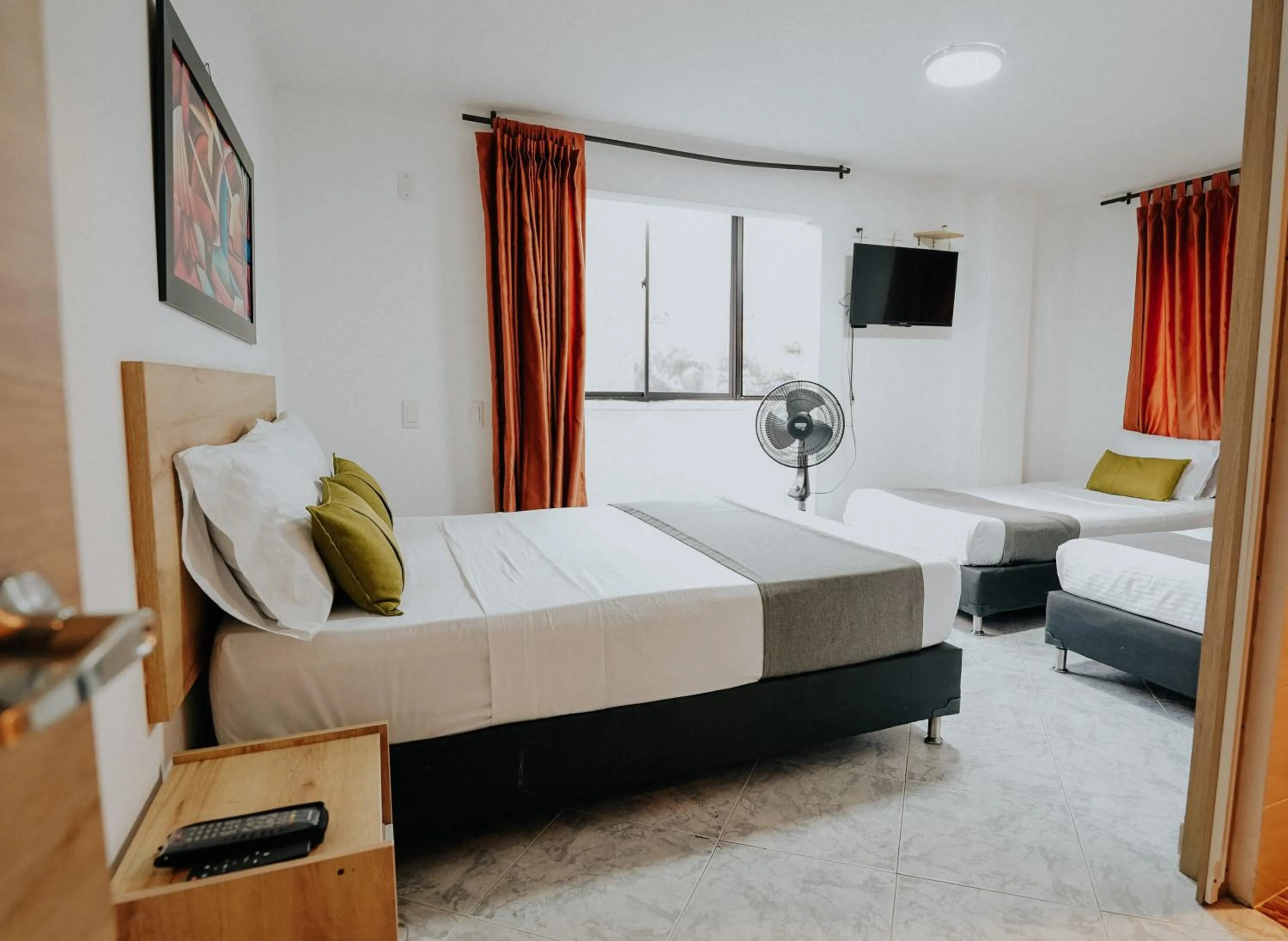 Communal lounge/ TV room, Bed in Hotel Balcones del Estadio