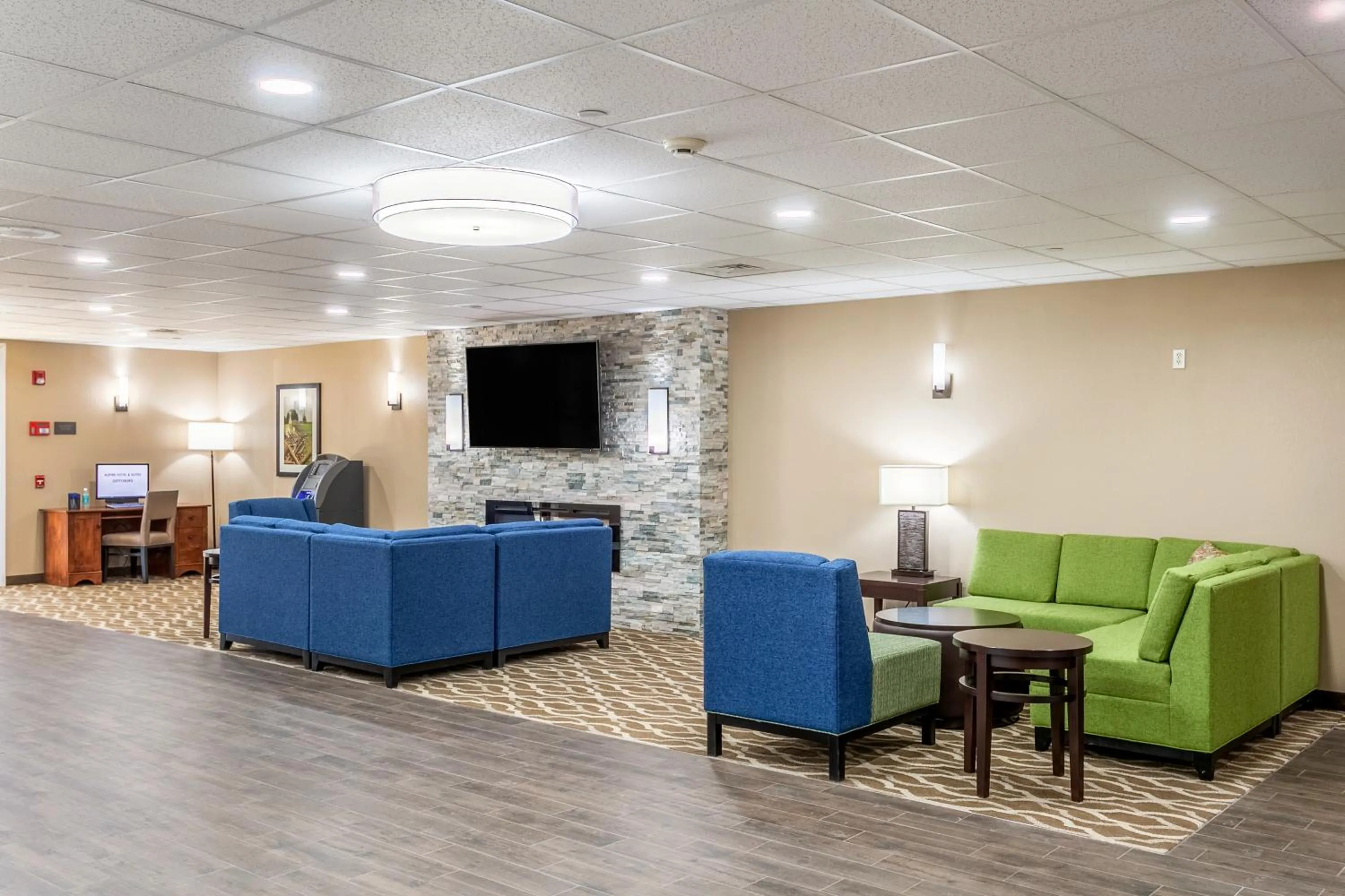 Lobby or reception in Aspire Hotel and Suites