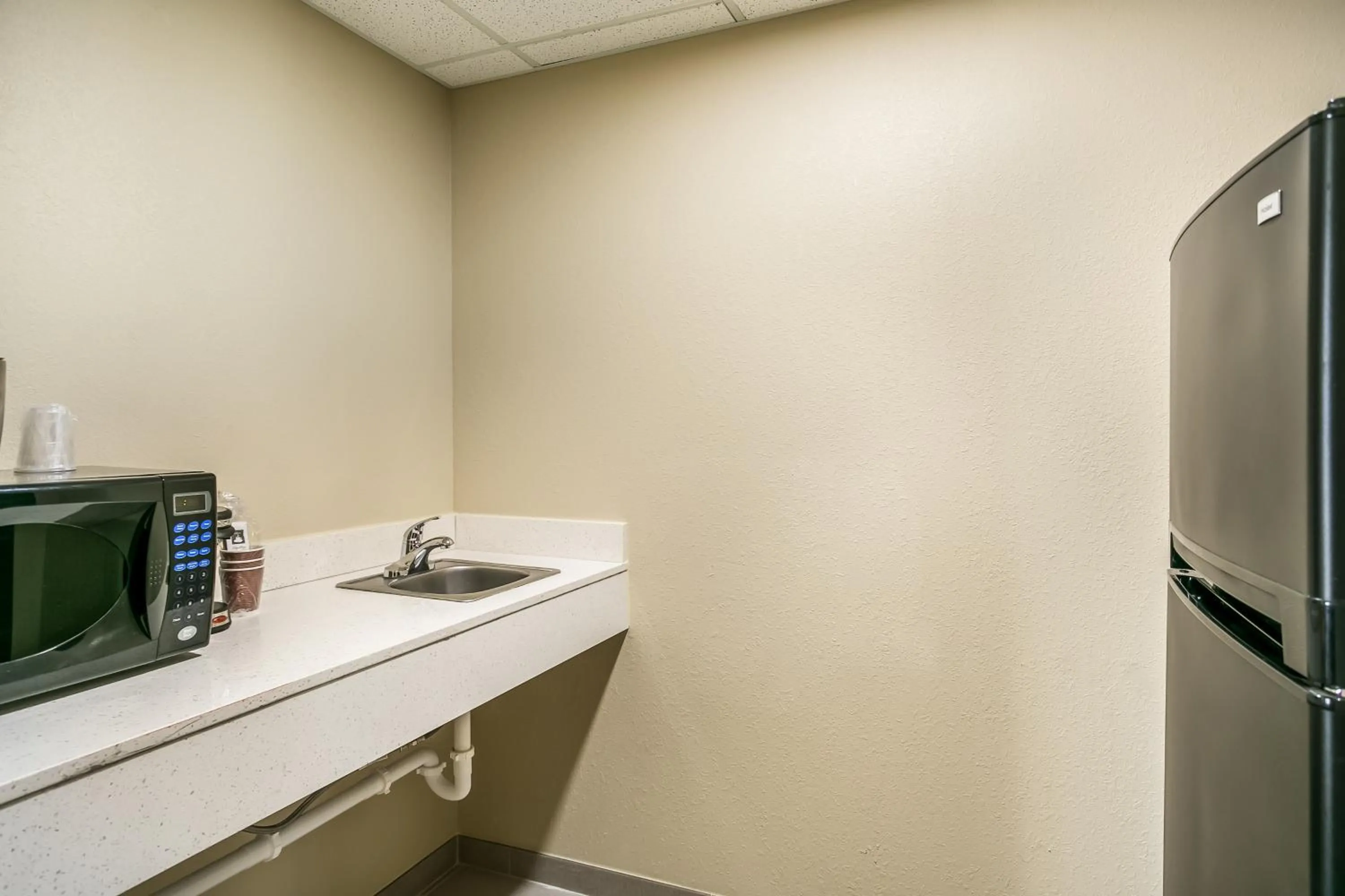 kitchen in Aspire Hotel and Suites