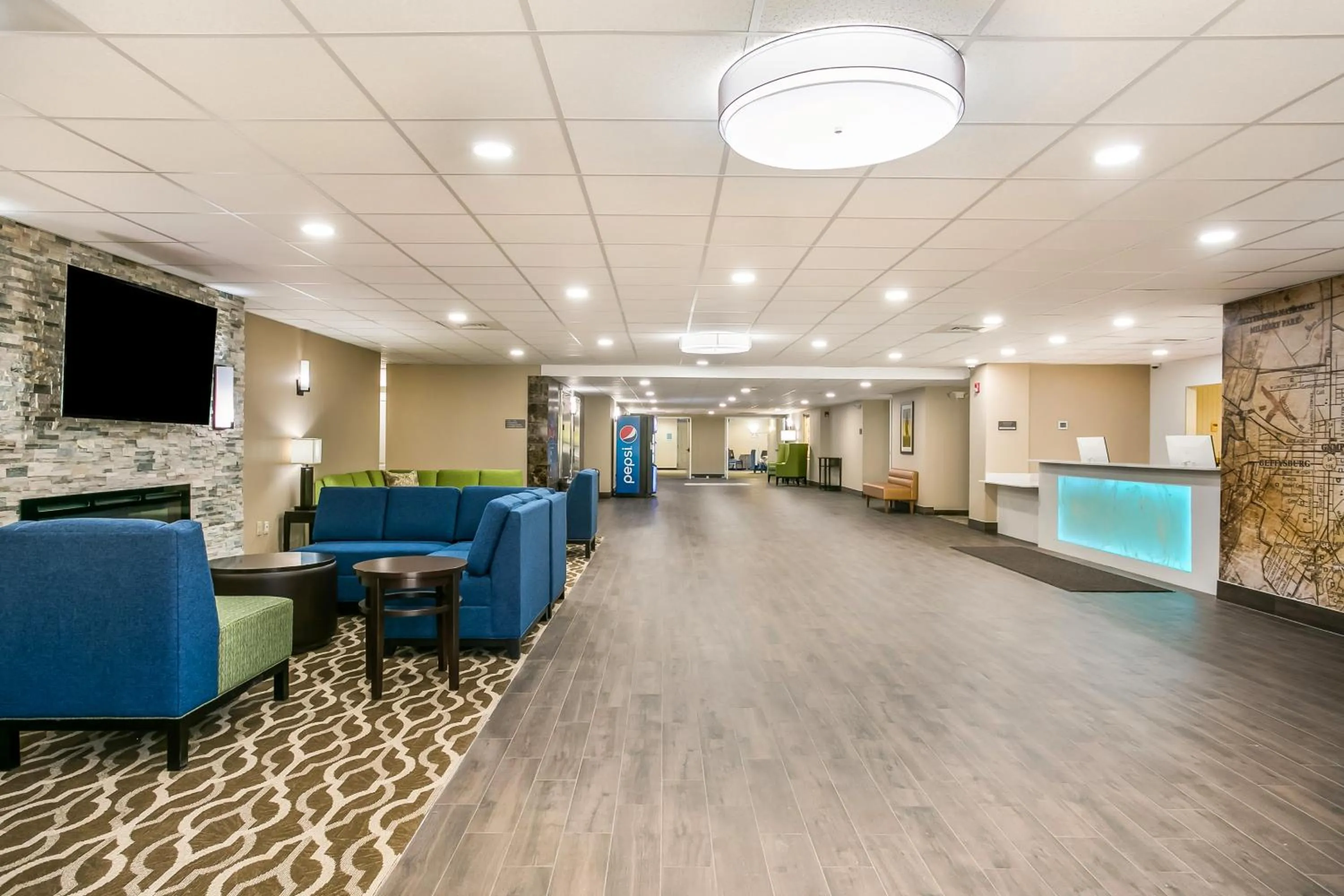 Lobby or reception in Aspire Hotel and Suites