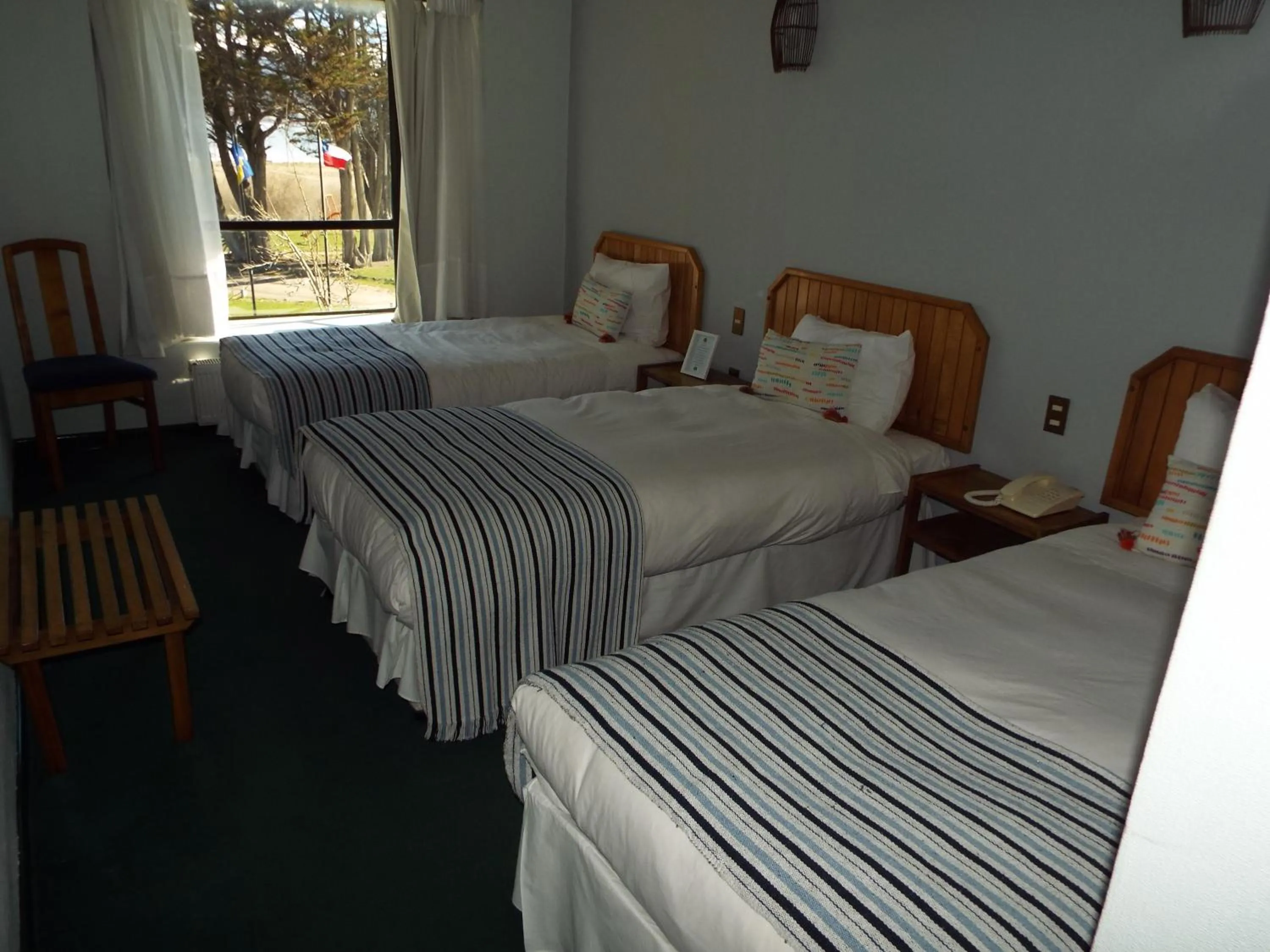 Bed in Hotel HD Natales