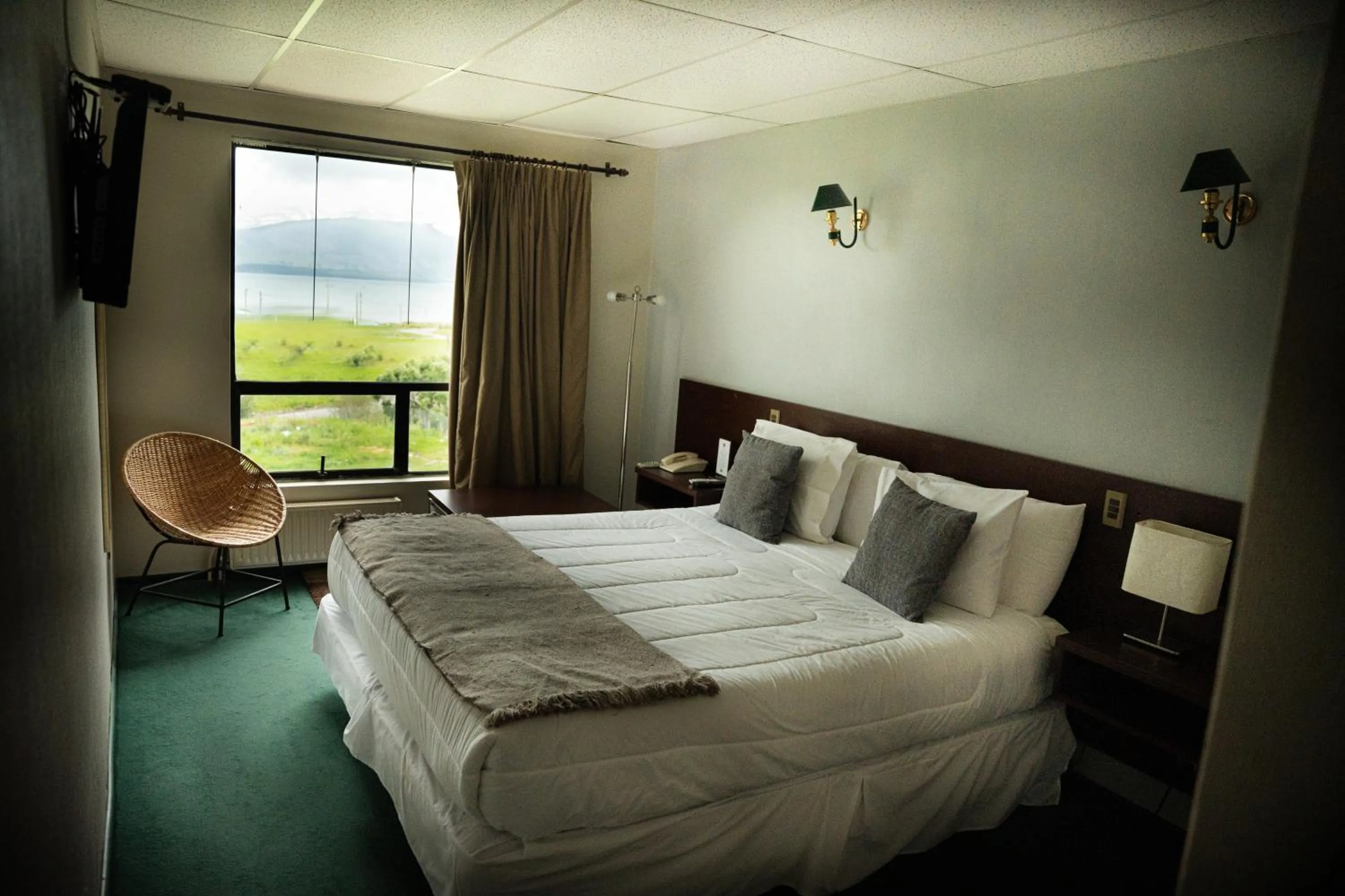 Bed in Hotel HD Natales