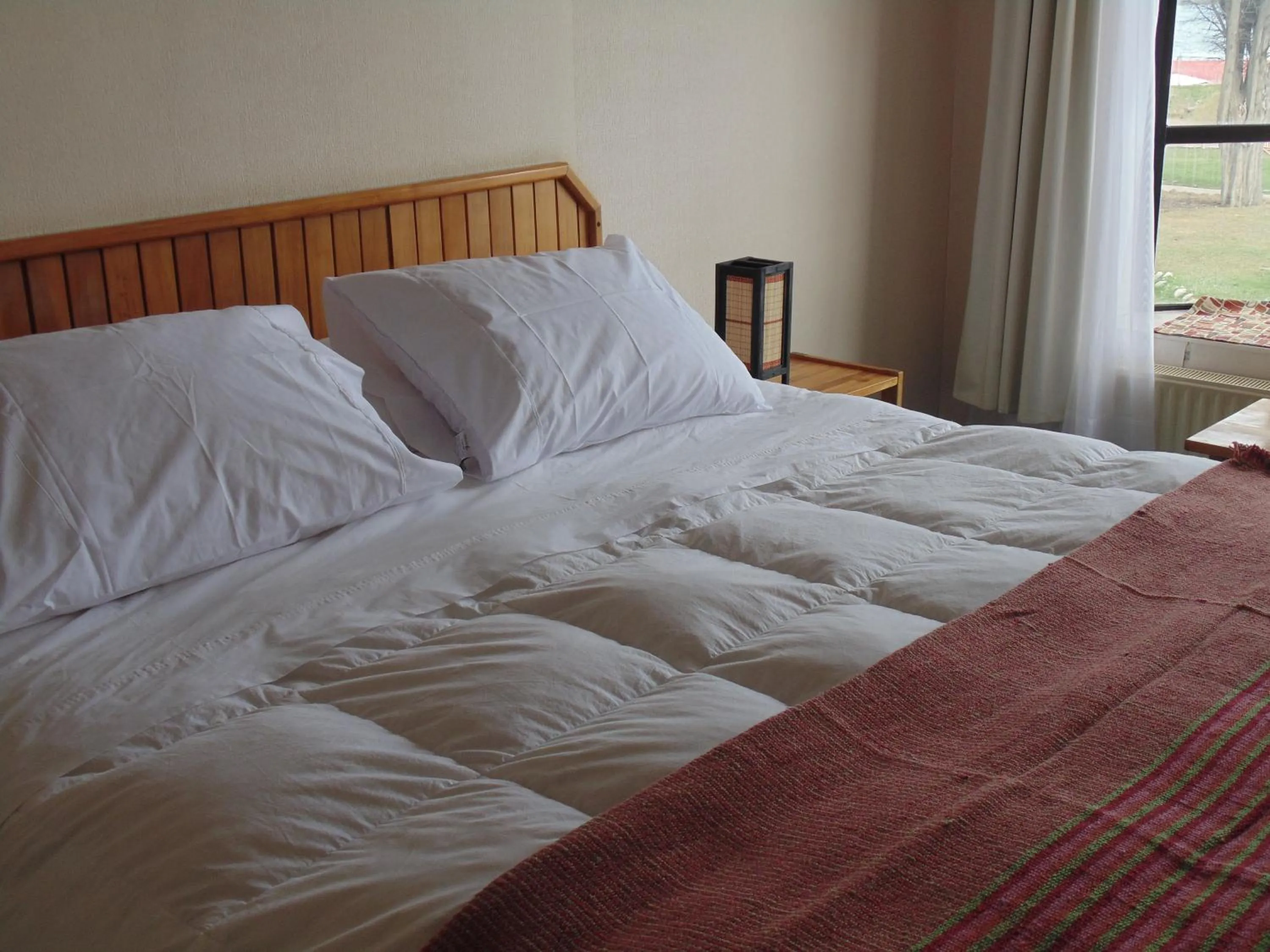 Bed in Hotel HD Natales
