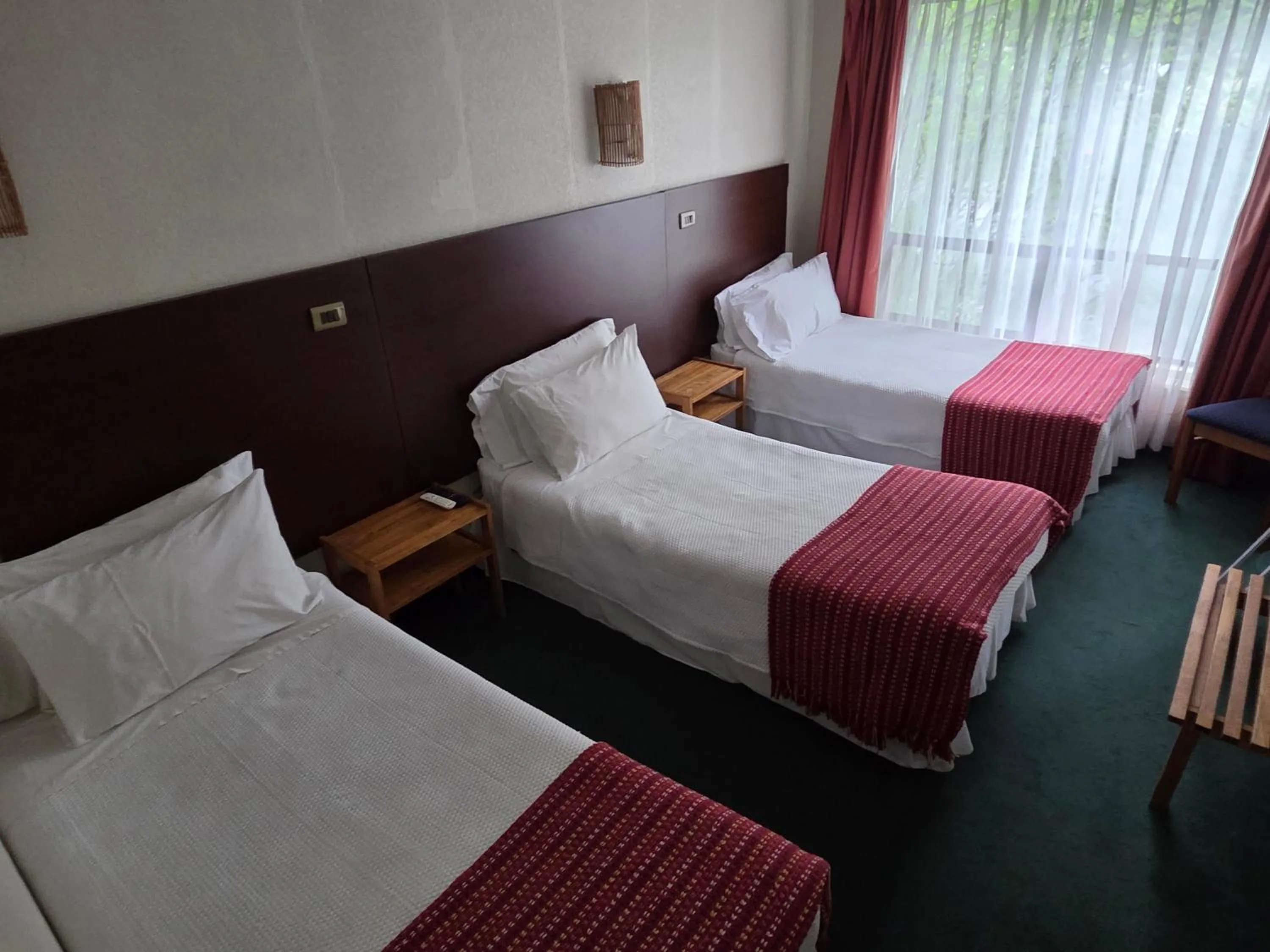 Bed in Hotel HD Natales