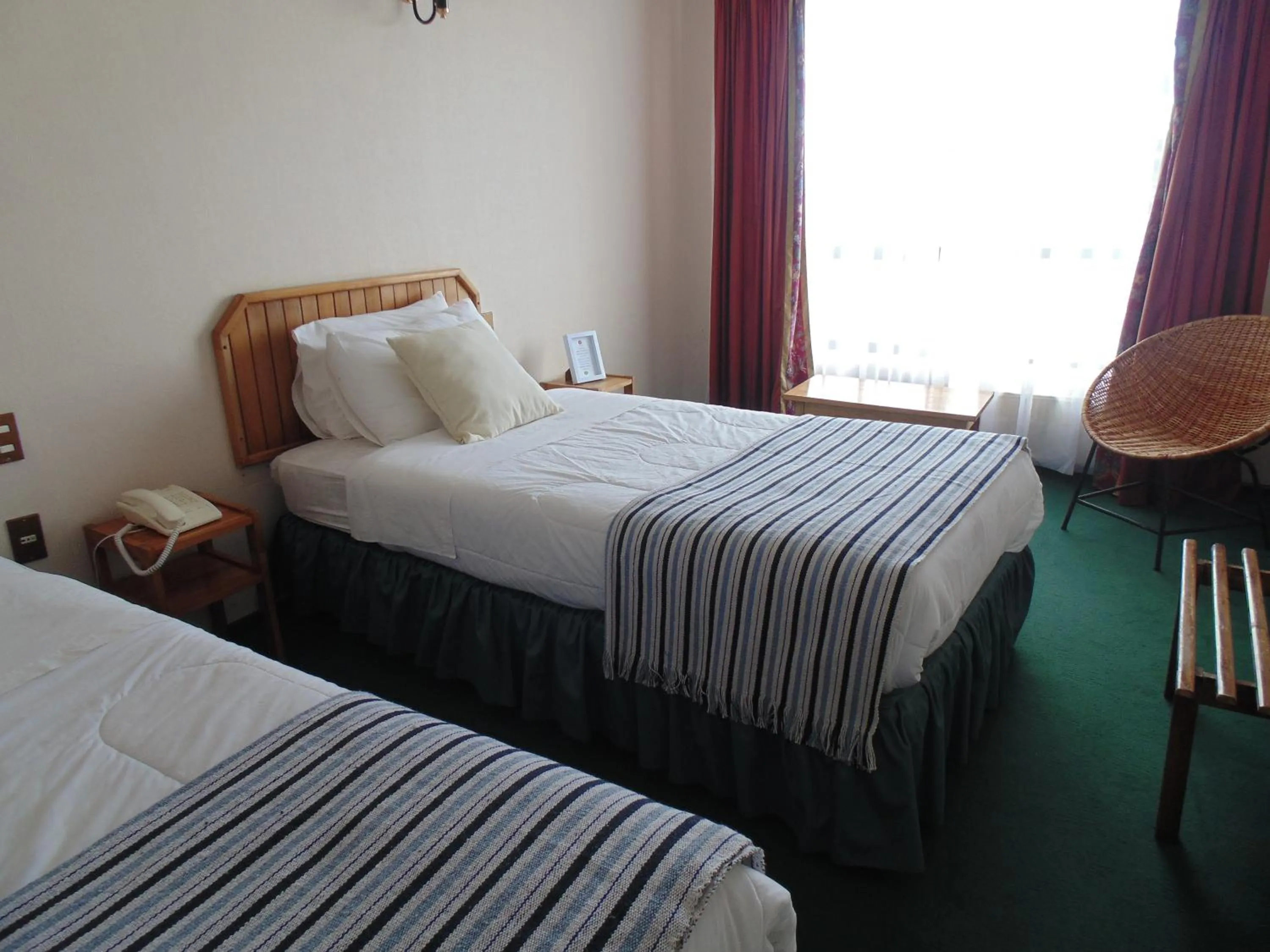 Bed in Hotel HD Natales