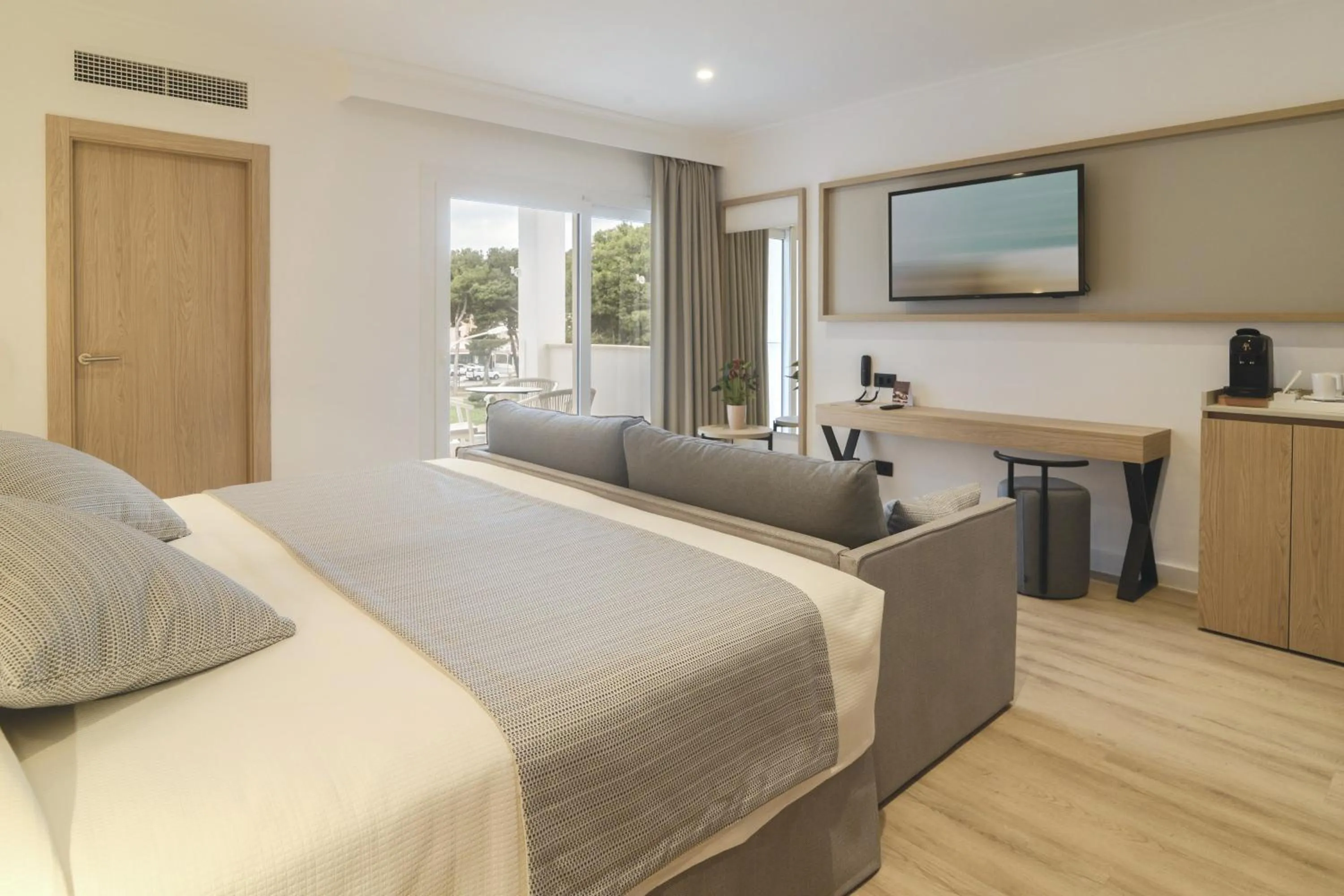 Bed in Hotel Capricho