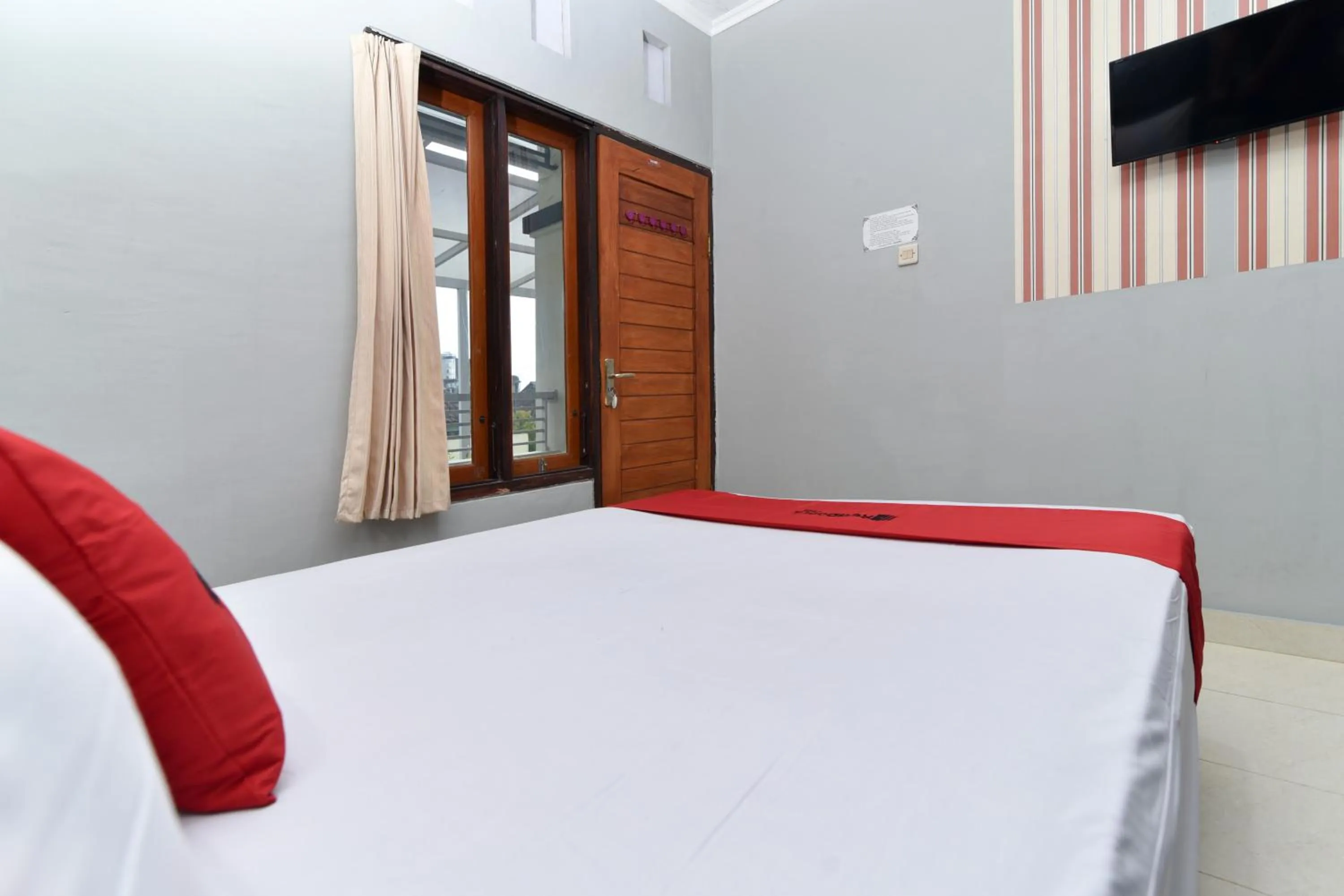 Bedroom in RedDoorz near Teuku Umar Barat Denpasar
