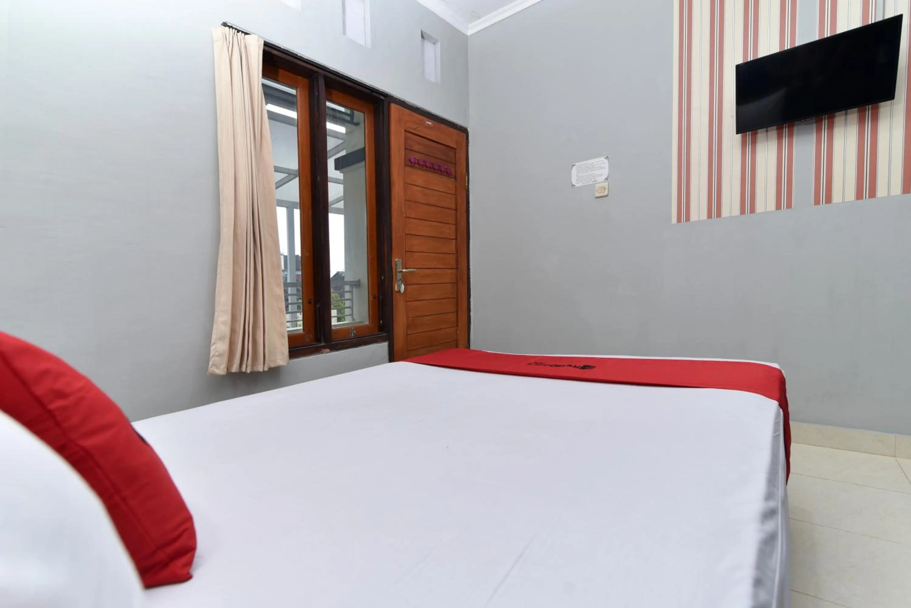 Bedroom in RedDoorz near Teuku Umar Barat Denpasar