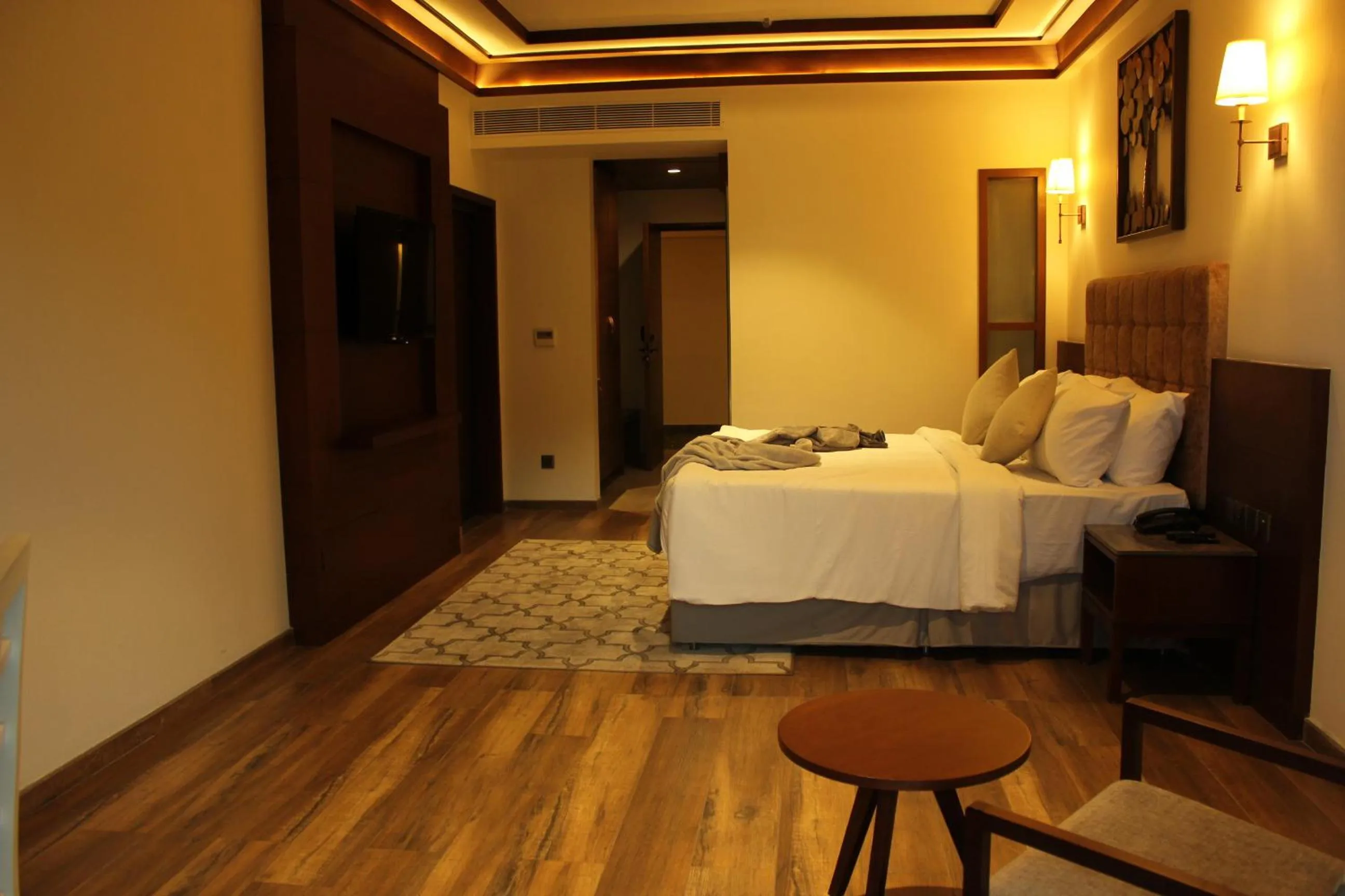 Bed in Niraamaya Retreats Samroha Athirappilly