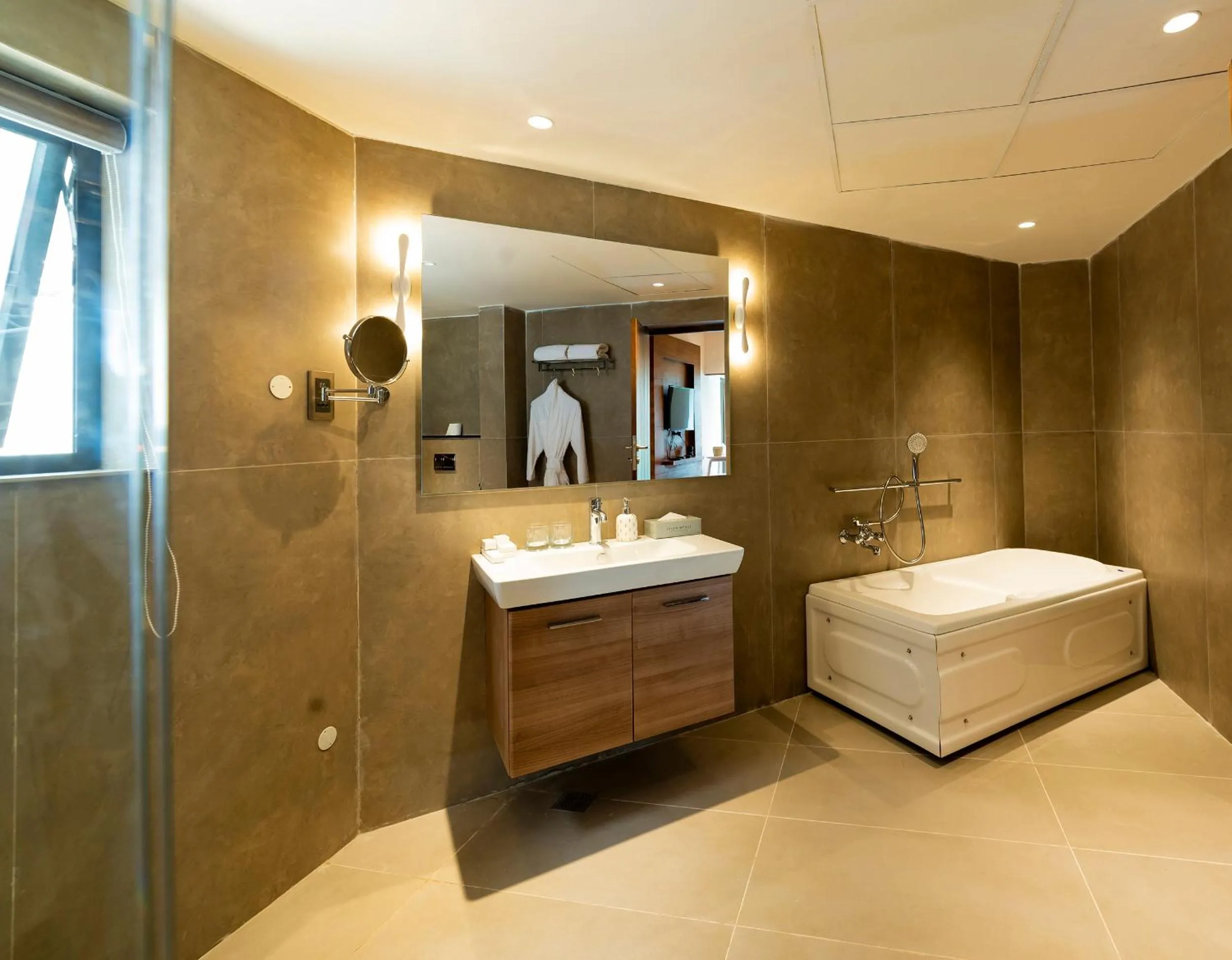 Bathroom, Bed in Niraamaya Retreats Samroha Athirappilly