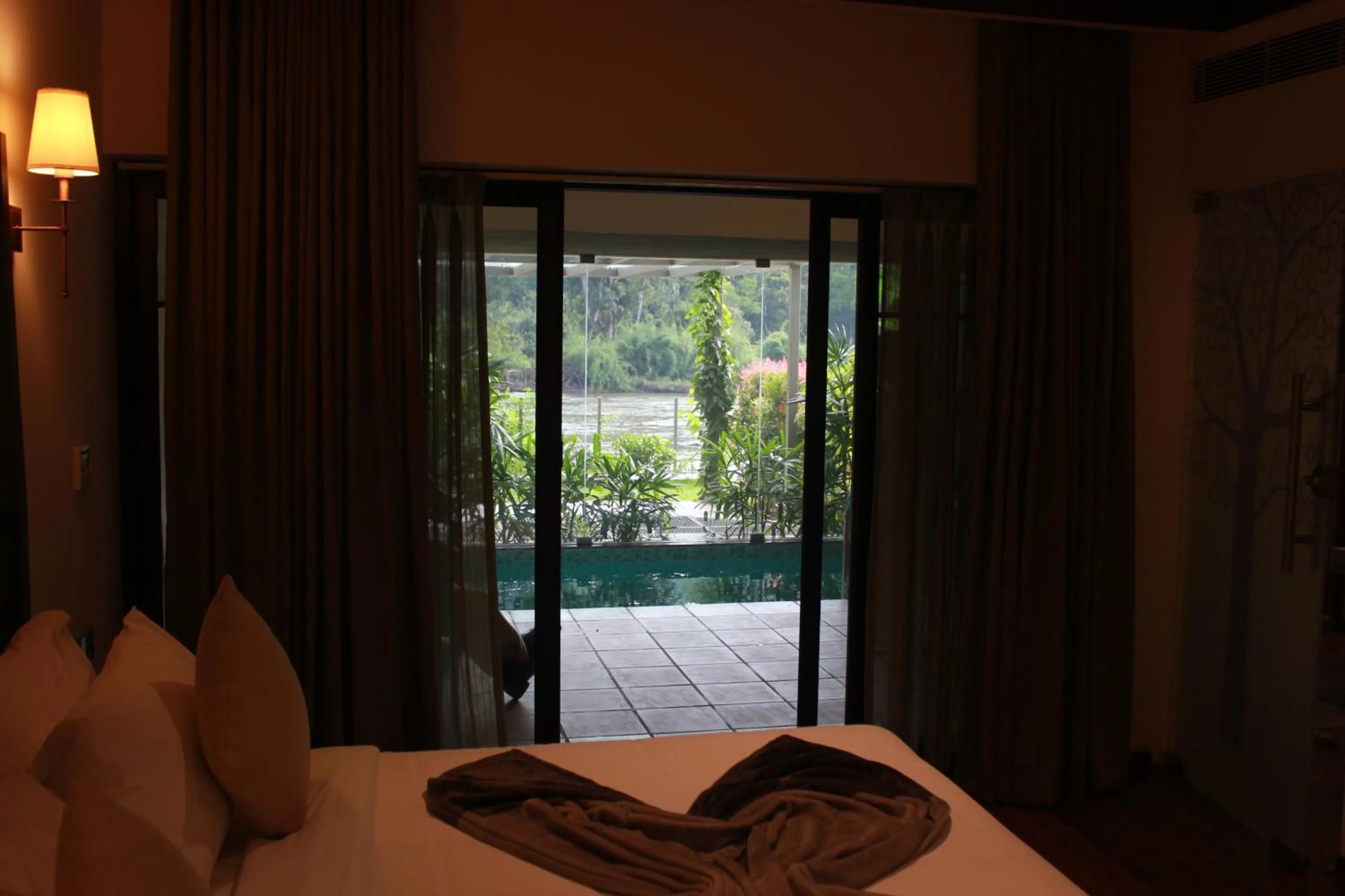 Garden view, Bed in Niraamaya Retreats Samroha Athirappilly