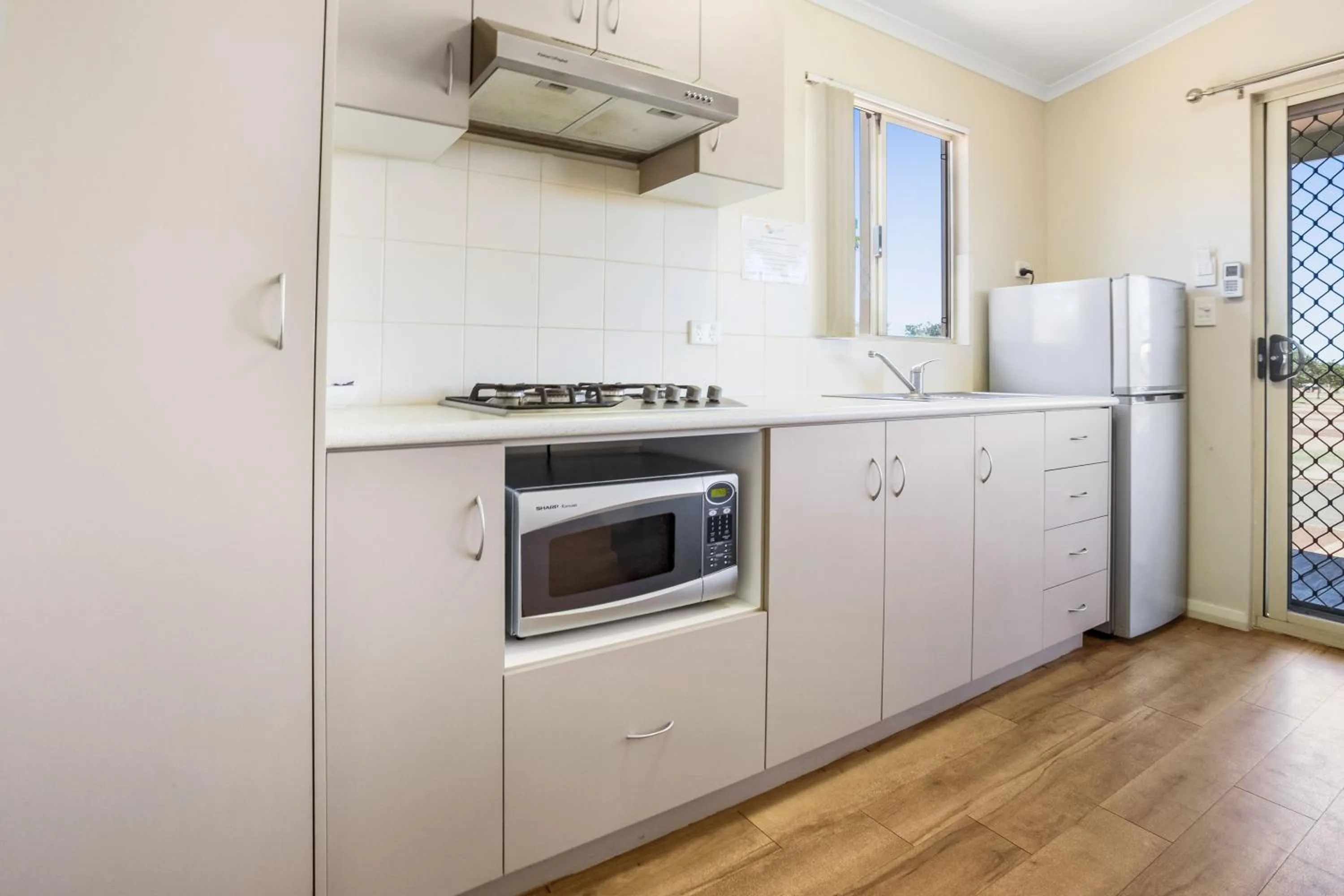 Kitchen or kitchenette in The Cove Holiday Village