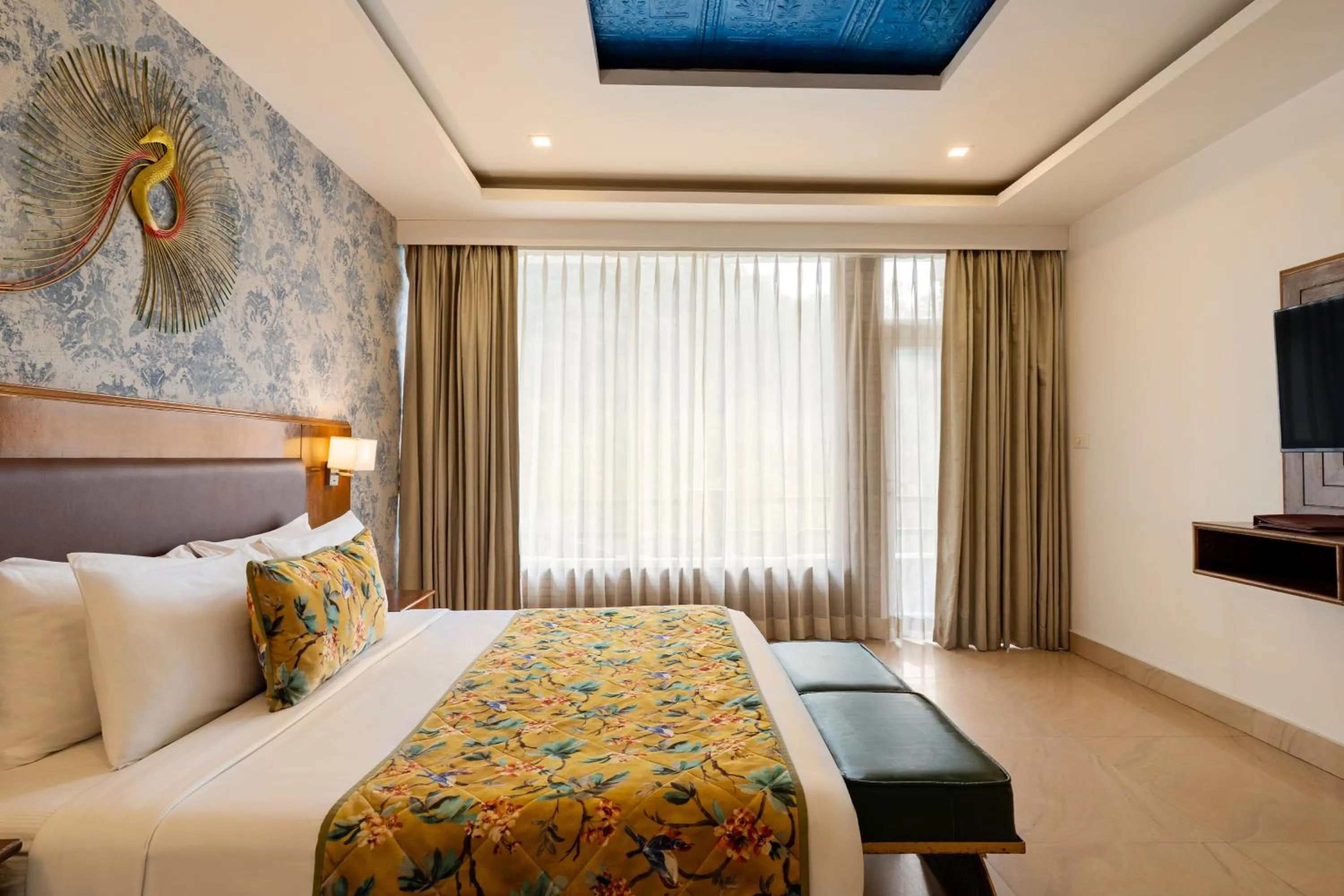 Bed in Summit By The Ganges Beach Resort & Spa