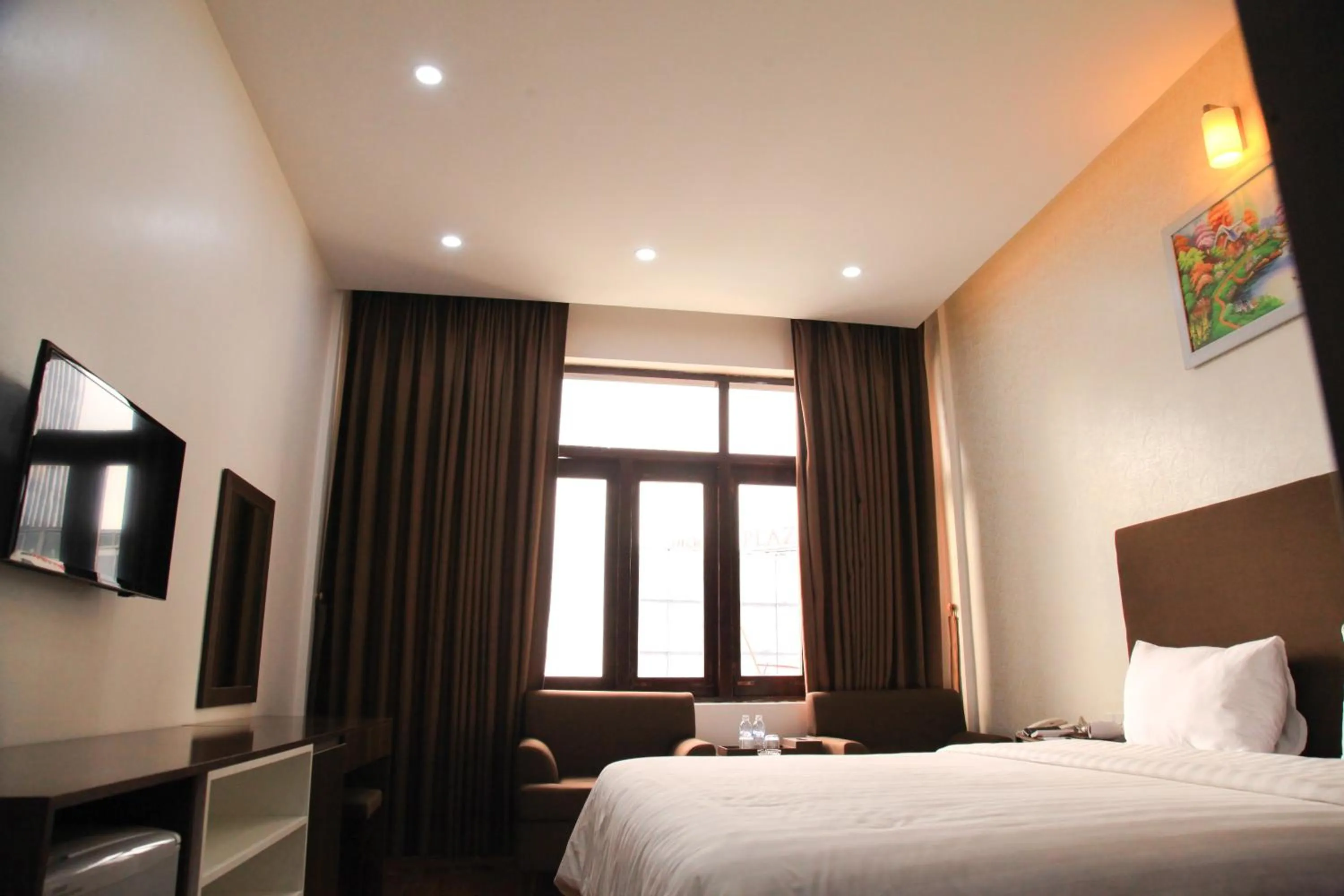 Bed in Bình Minh Hotel