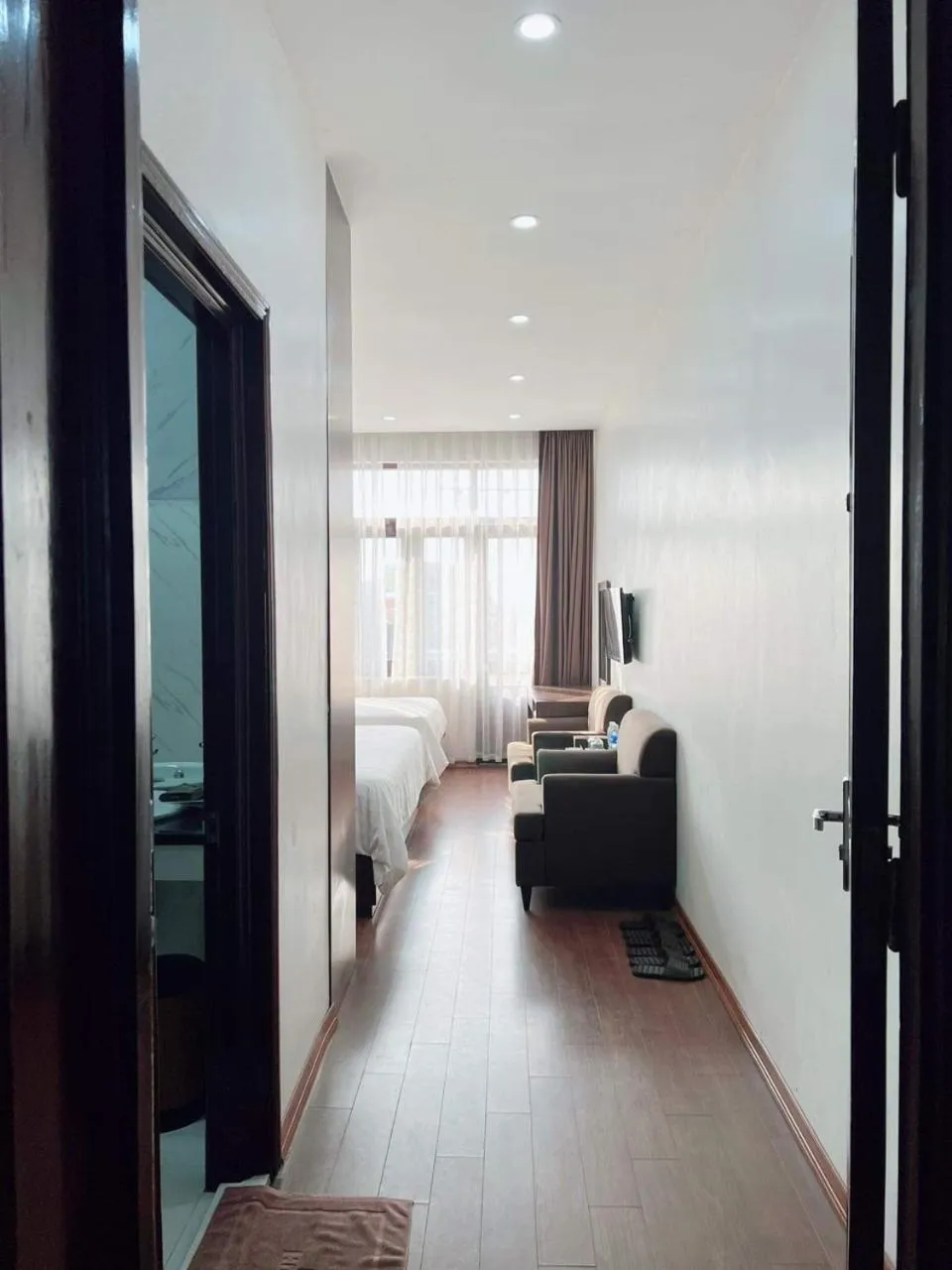 Bed in Bình Minh Hotel