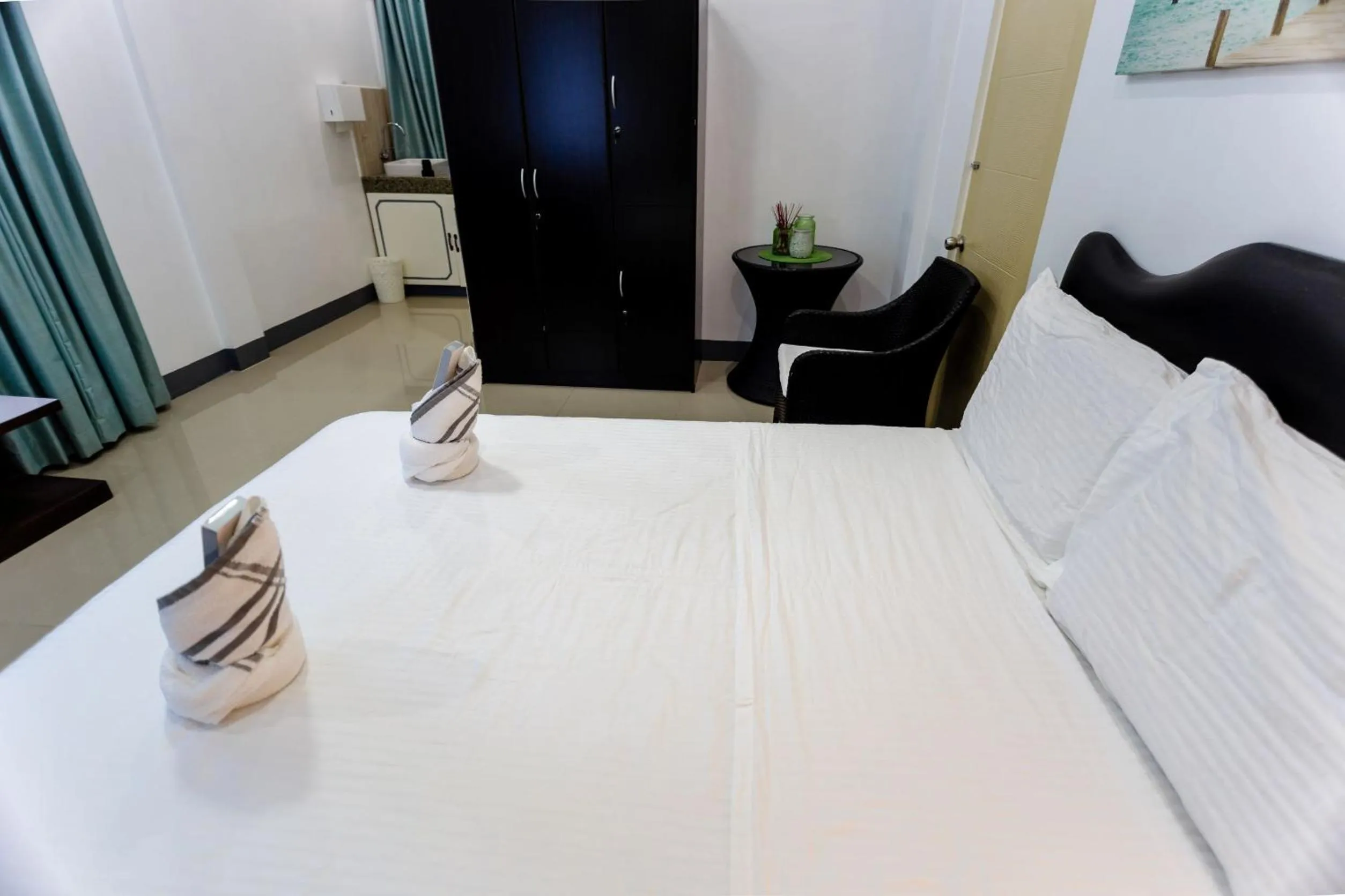 Bed in MADISON GARDEN AND RESIDENCES