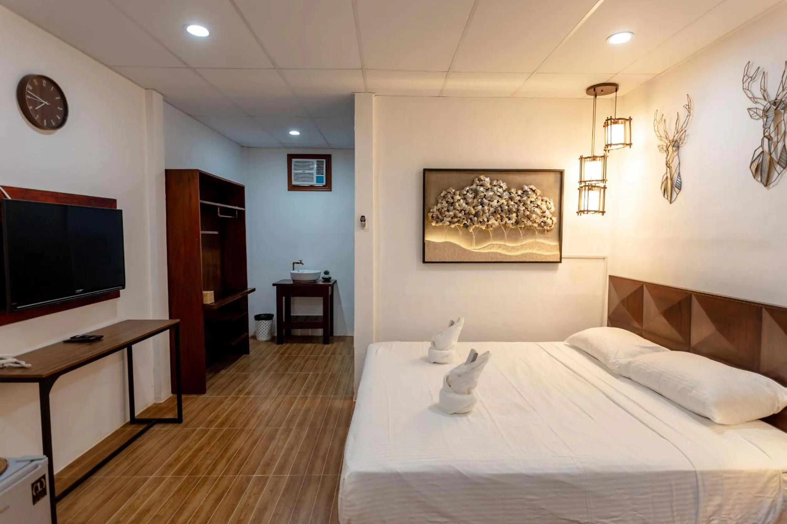 Bed in MADISON GARDEN AND RESIDENCES