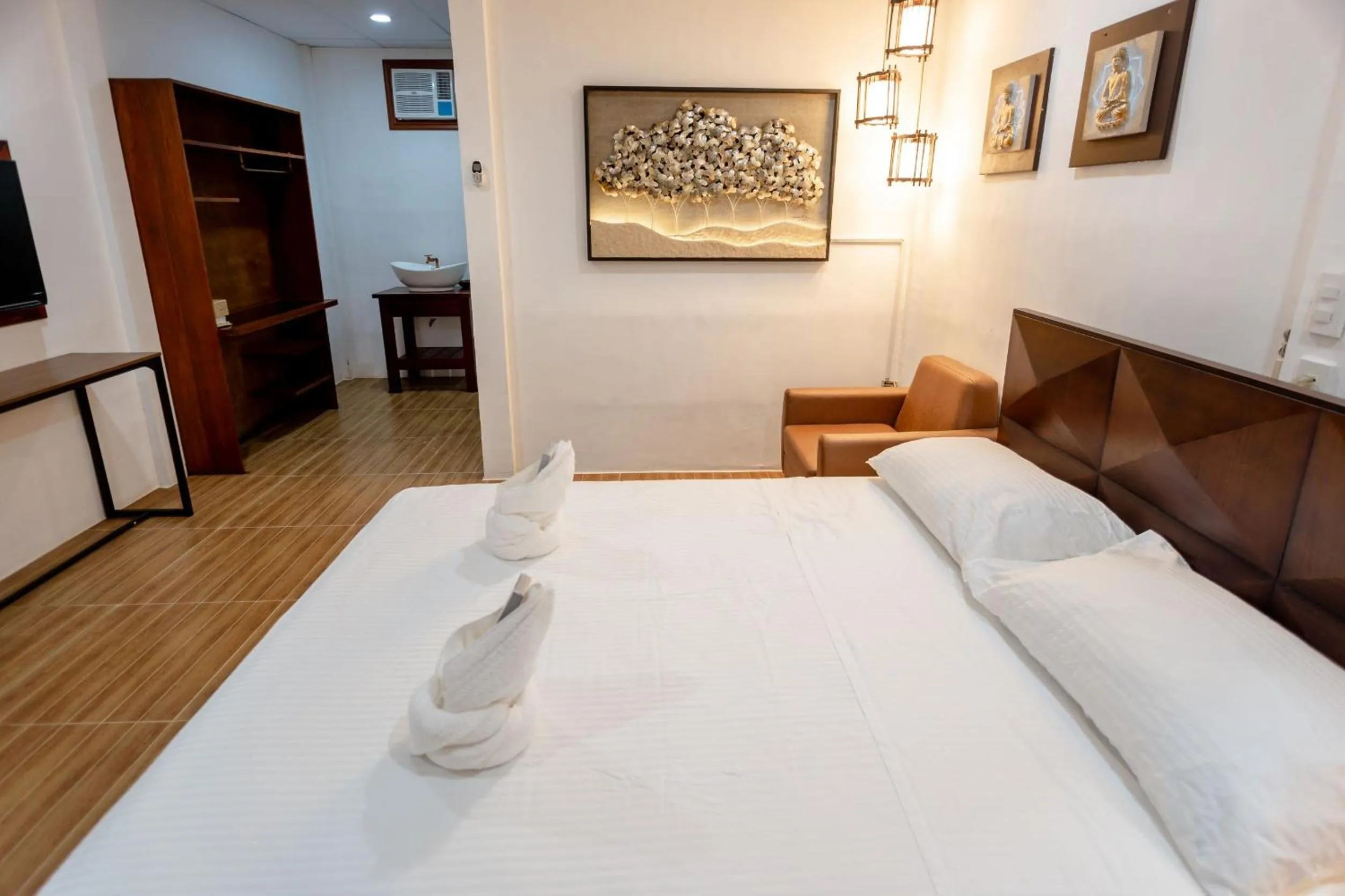 Bed in MADISON GARDEN AND RESIDENCES