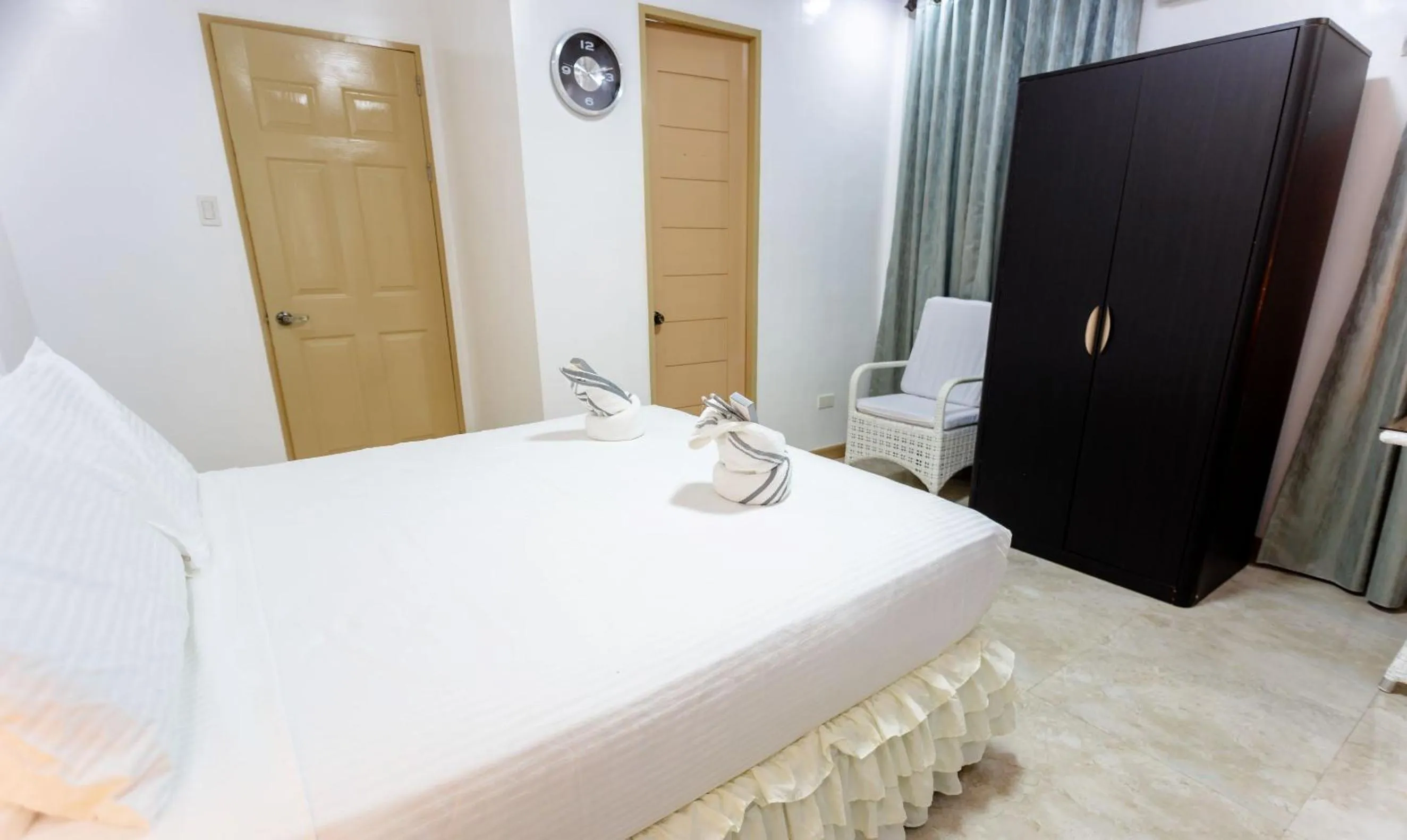 Bed in MADISON GARDEN AND RESIDENCES