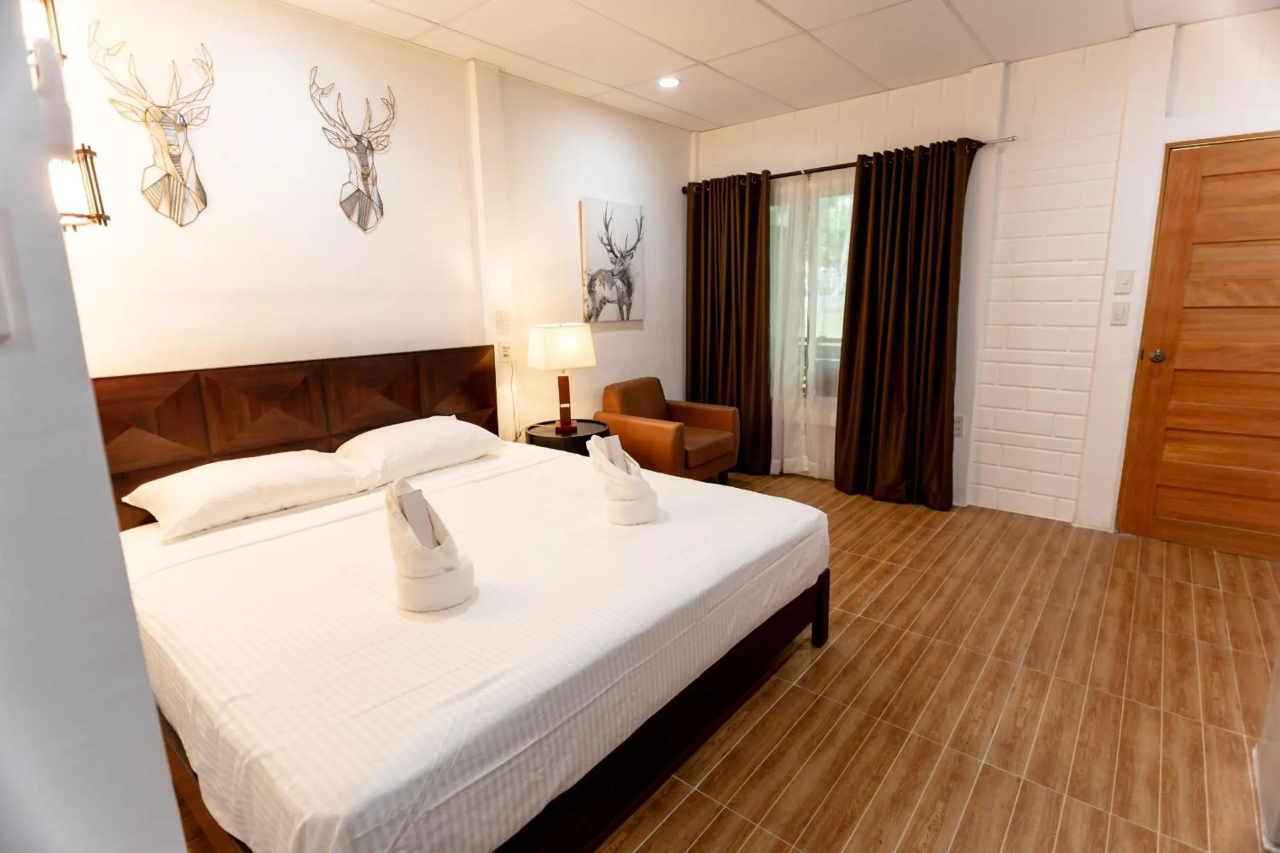 Bed in MADISON GARDEN AND RESIDENCES