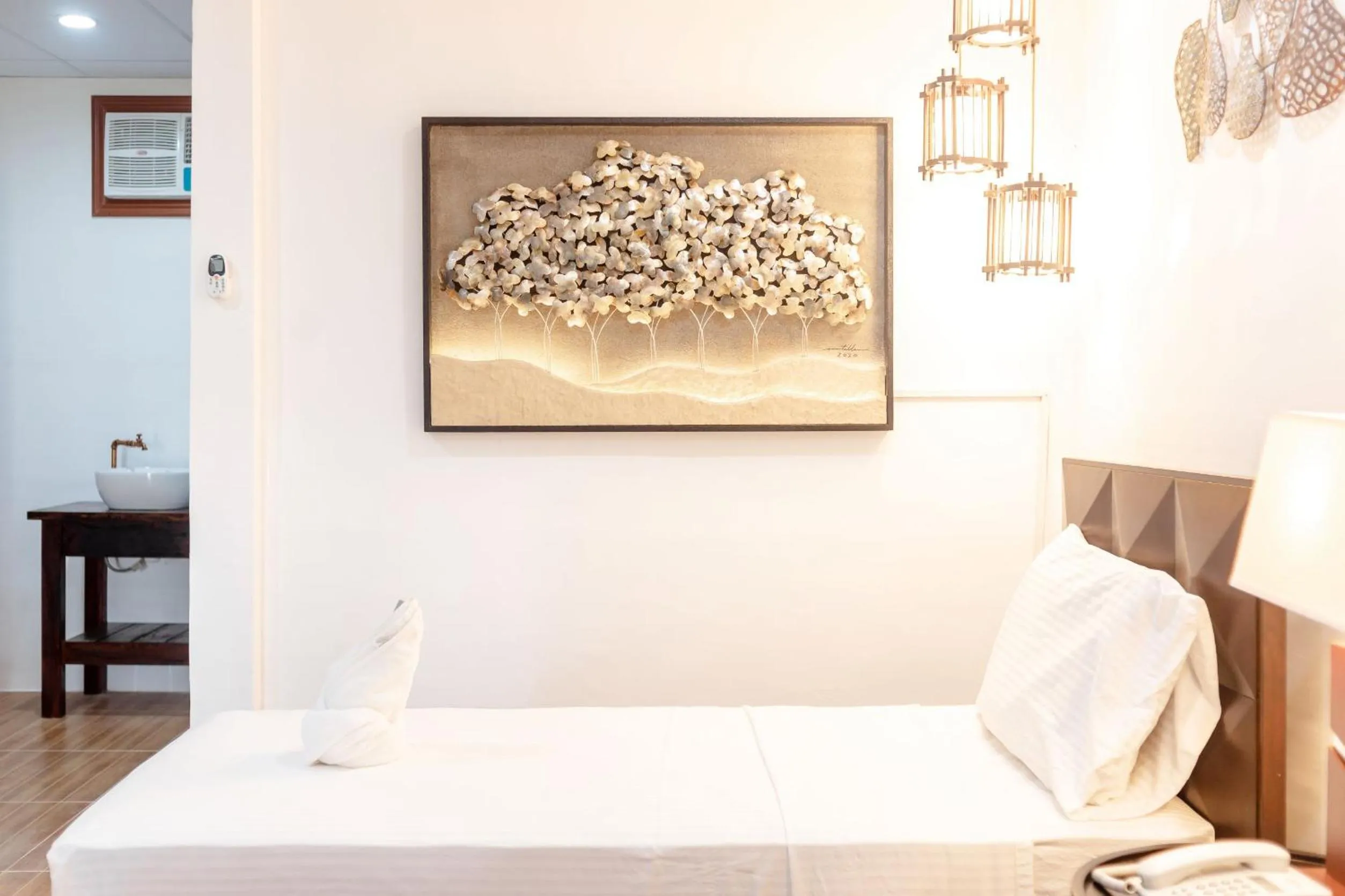 Bed in MADISON GARDEN AND RESIDENCES