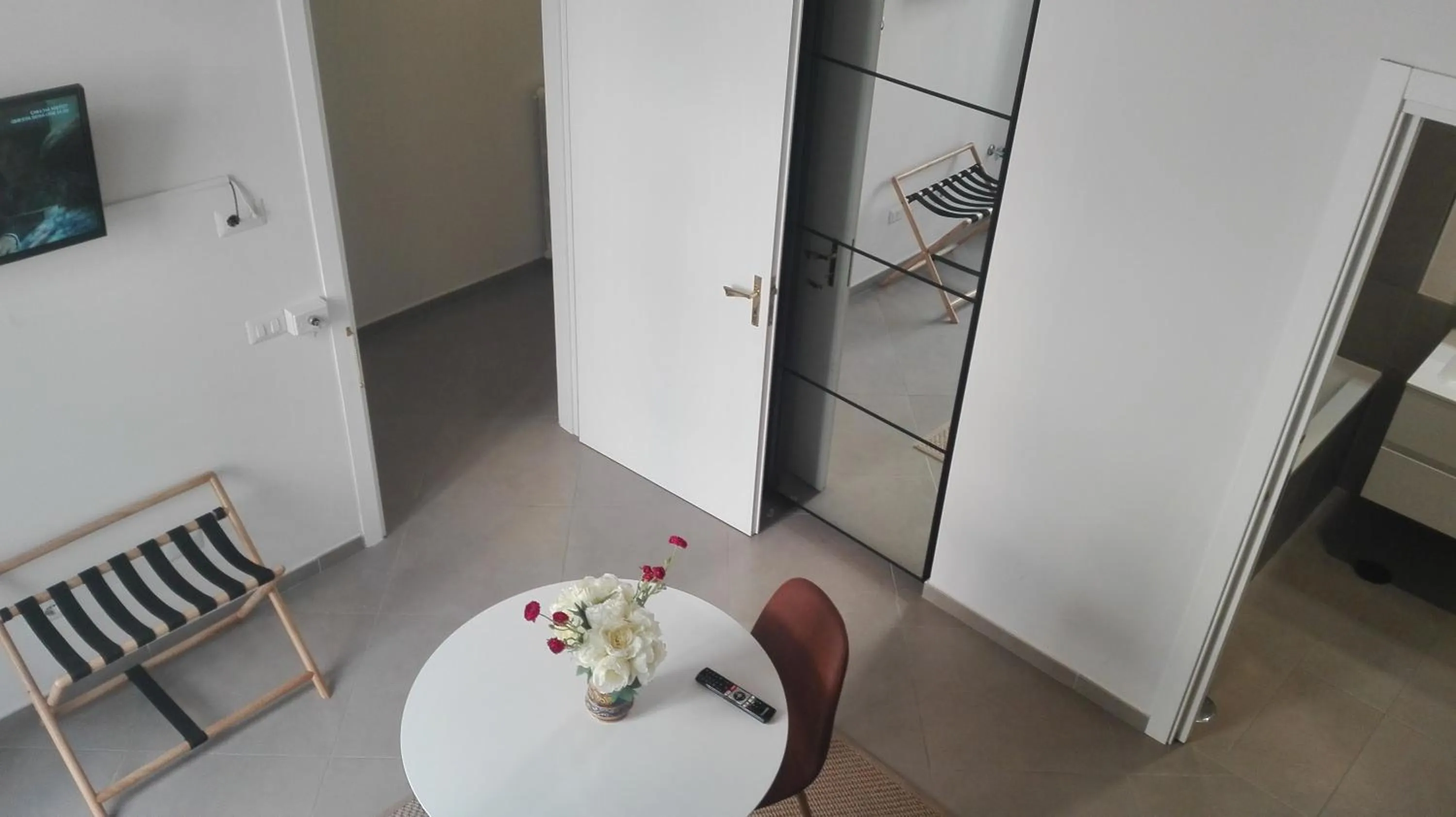 Living room in Piano Nobile by Napoliapartments