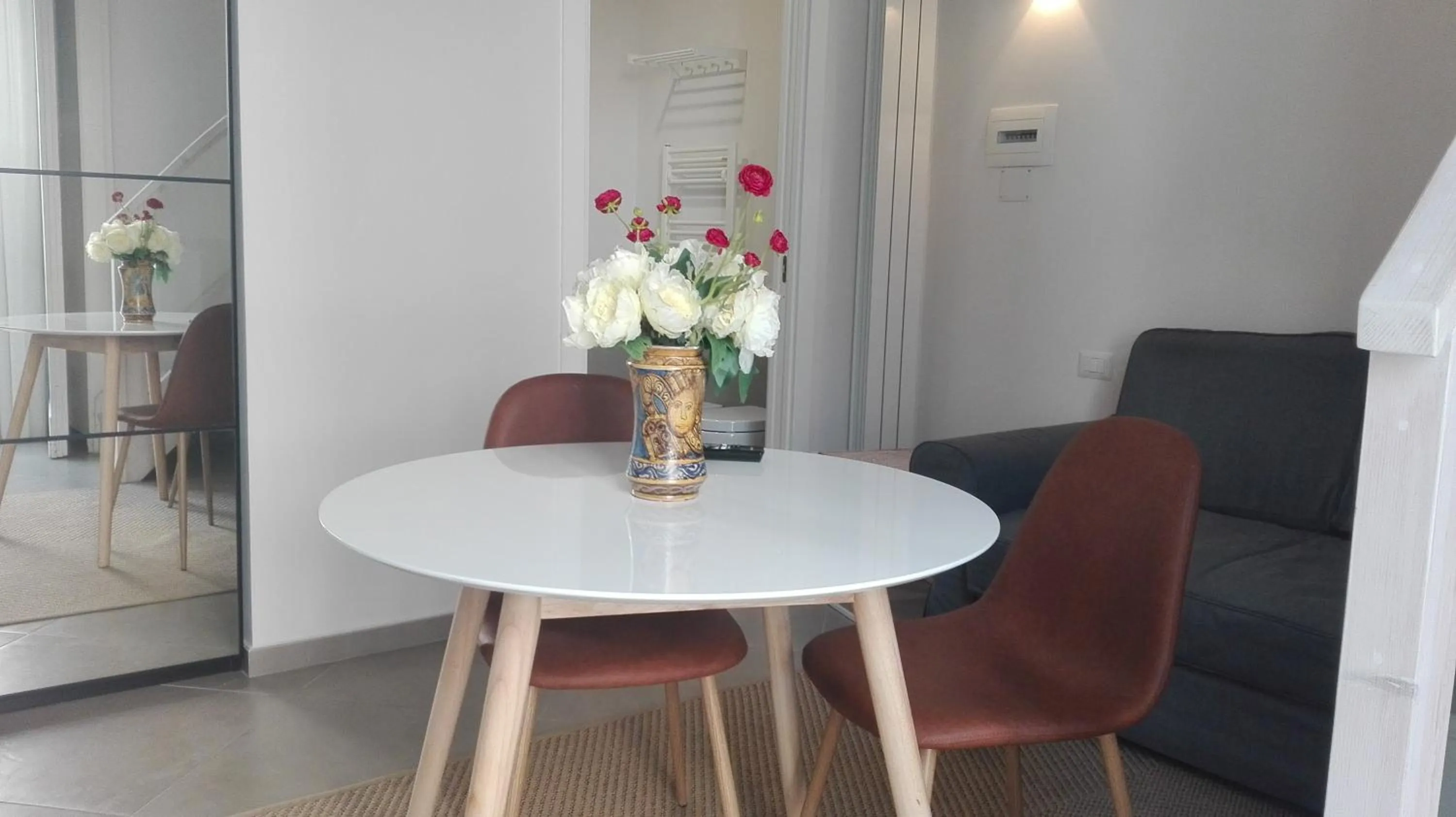 Living room in Piano Nobile by Napoliapartments