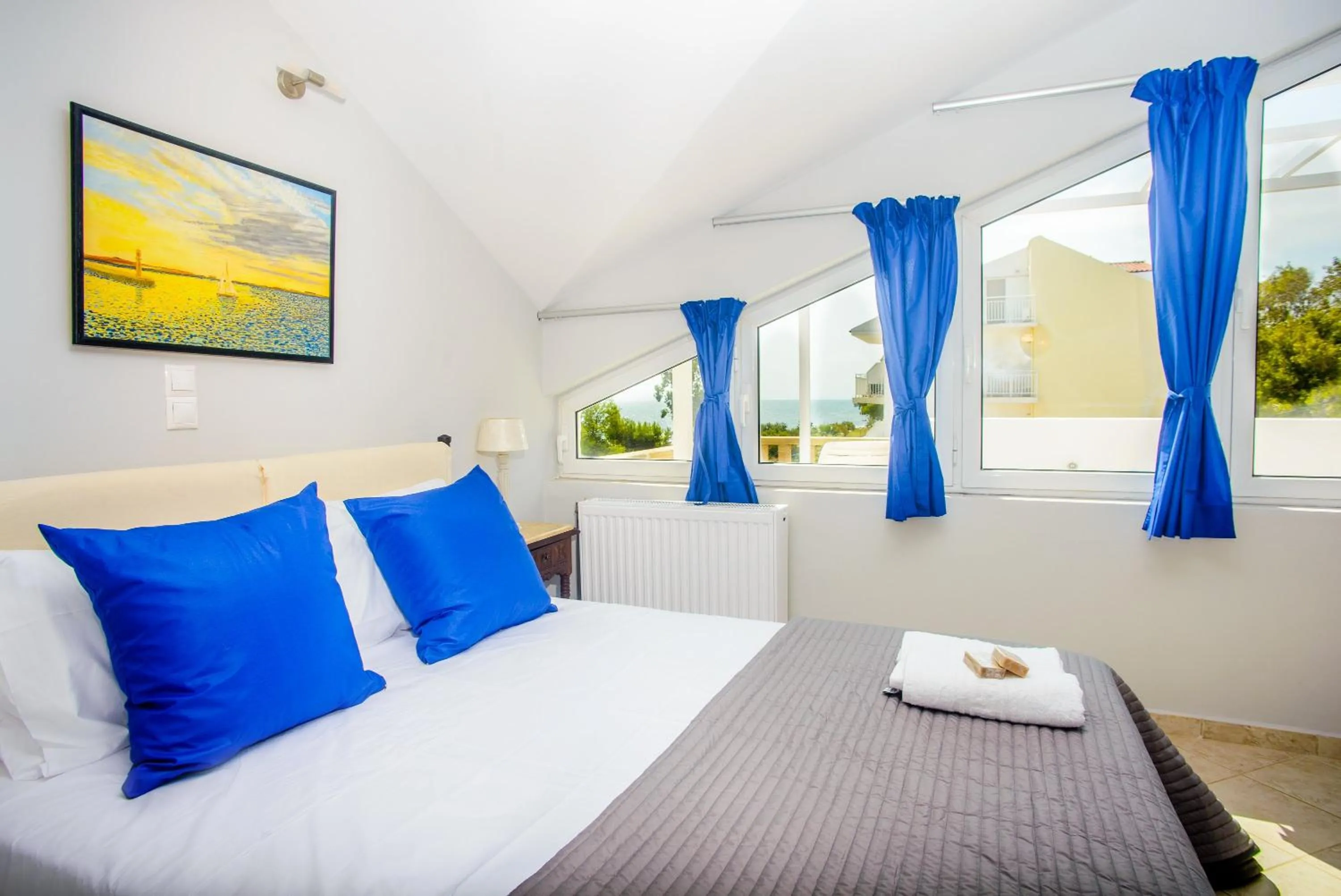 Bed in Xenia Ionis luxury apartments