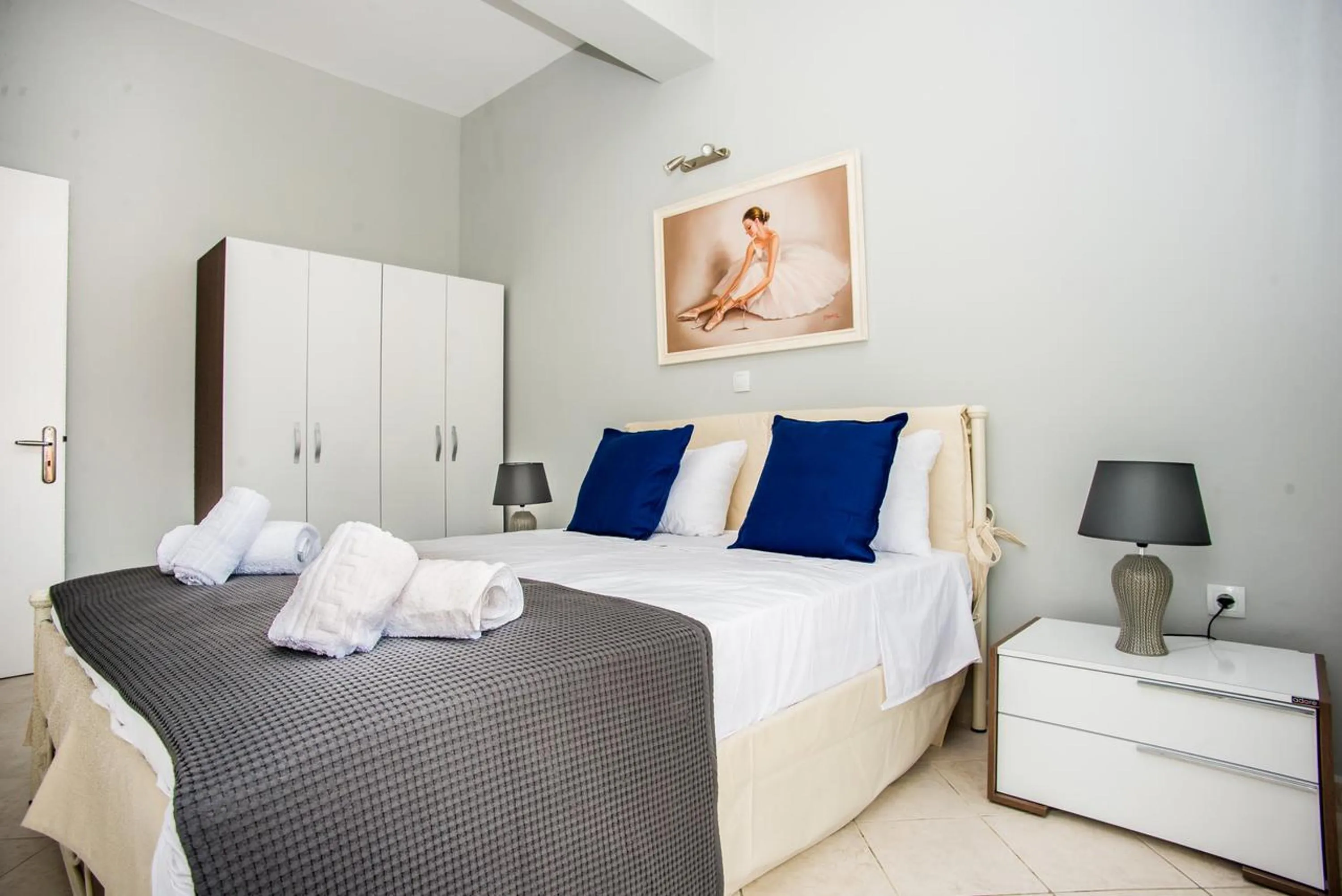 Bed in Xenia Ionis luxury apartments