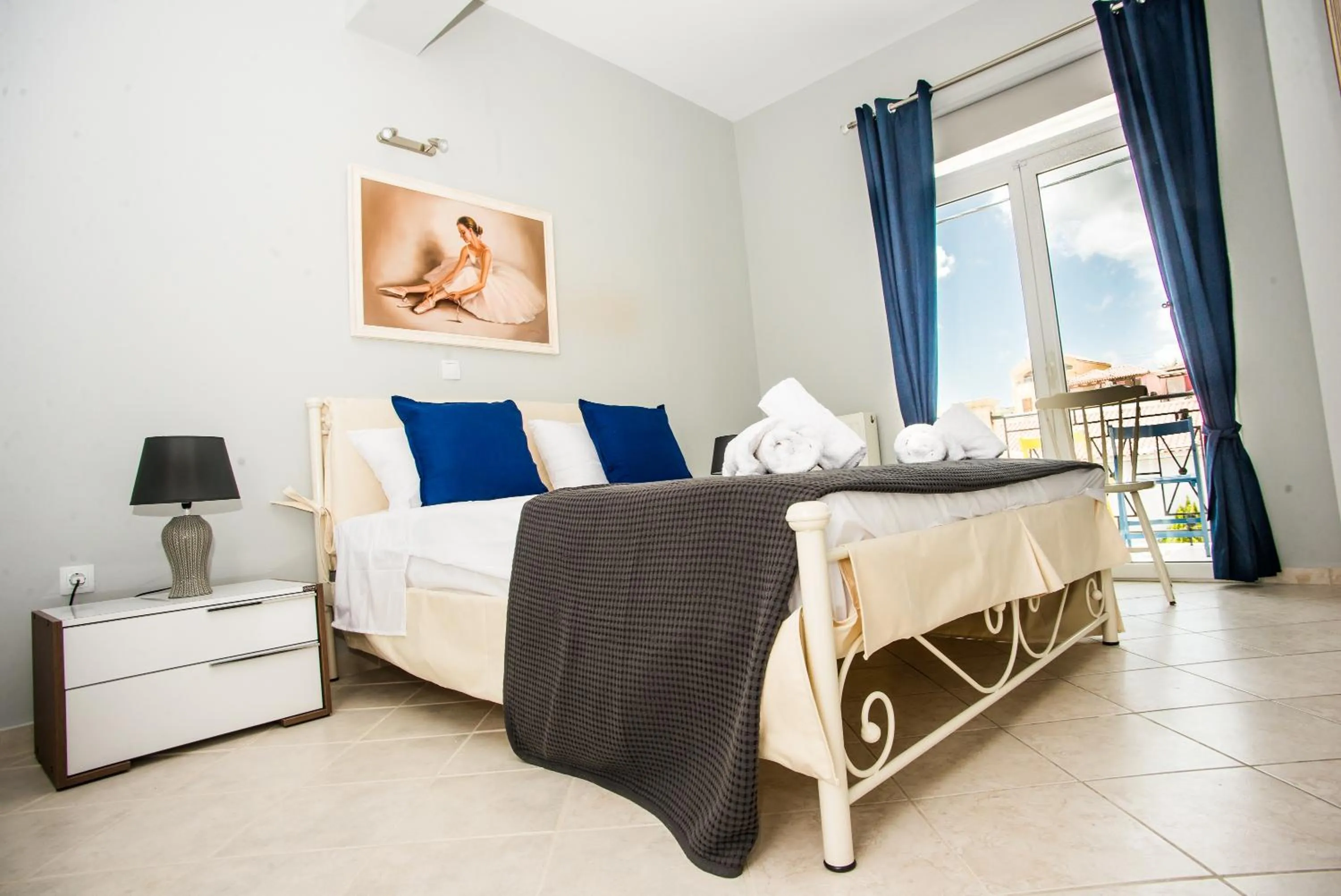 Bed in Xenia Ionis luxury apartments