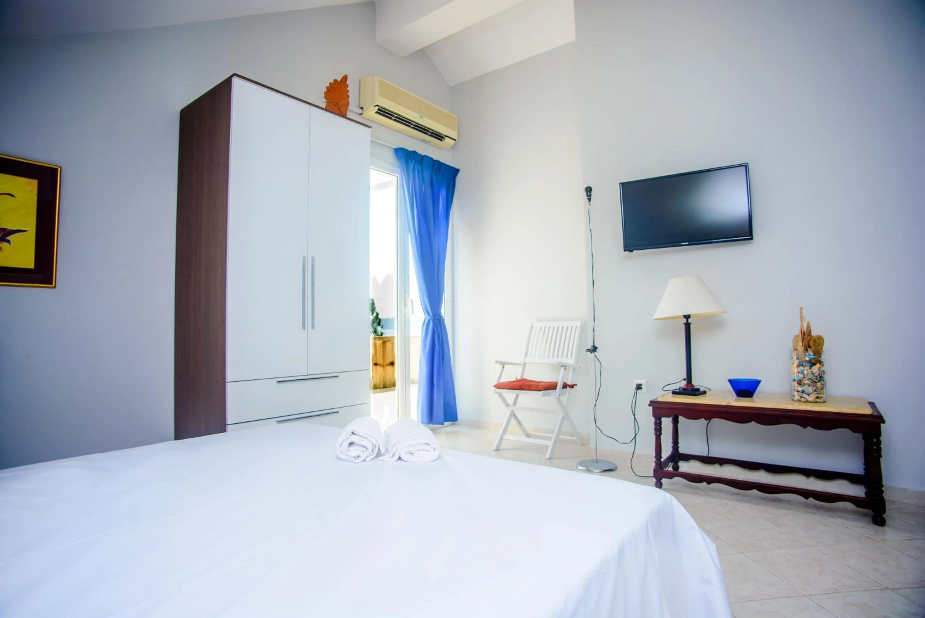 Bed in Xenia Ionis luxury apartments