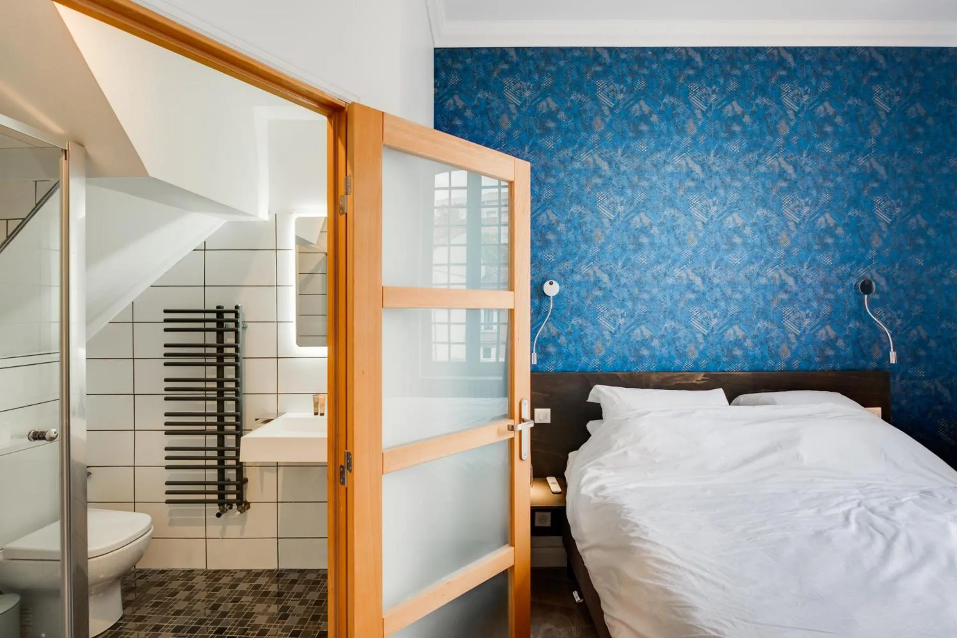 Bed in Hôtel Une Chambre en Ville