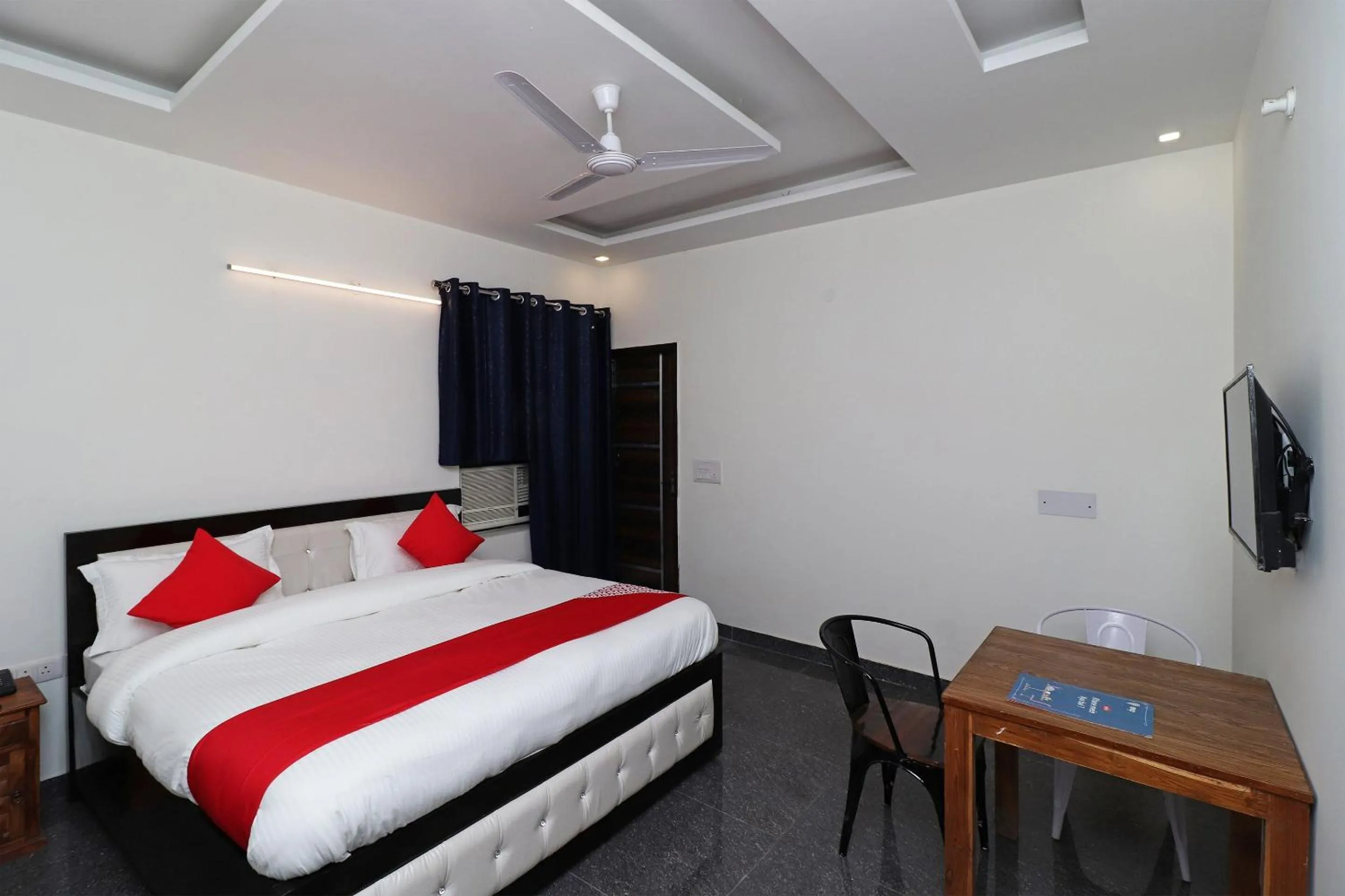 Bedroom in Hotel O Laxmi Residency